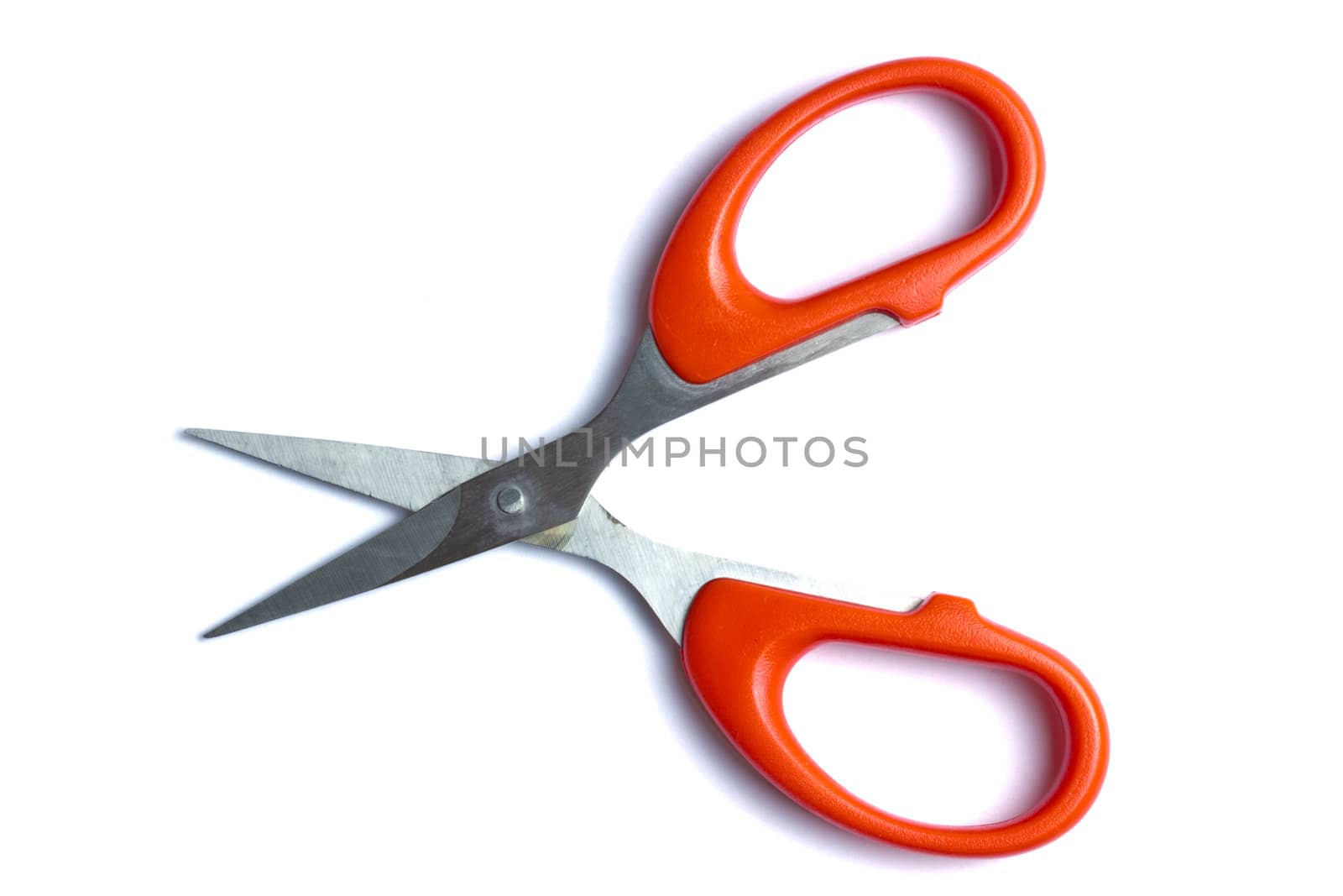 Red scissors isolated on white background 