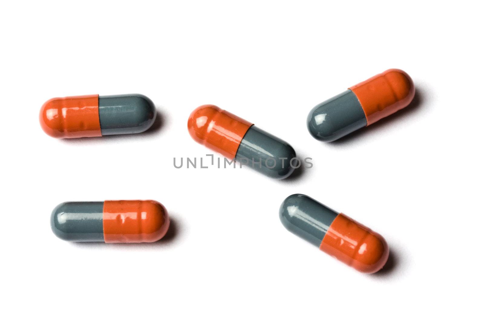 A few capsules isolated on white background 
