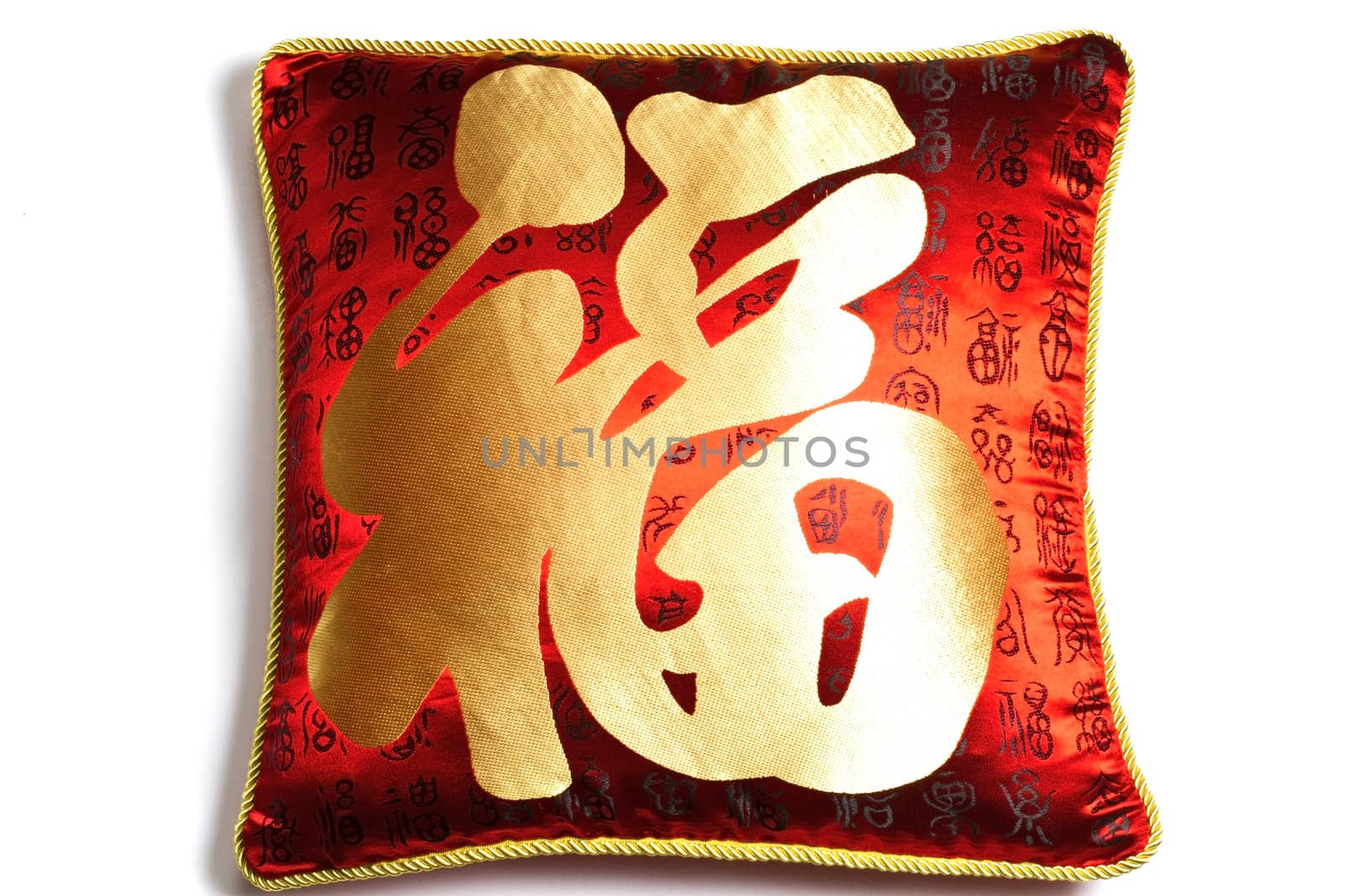 Beautiful red cushion with Chinese characters isolated on white