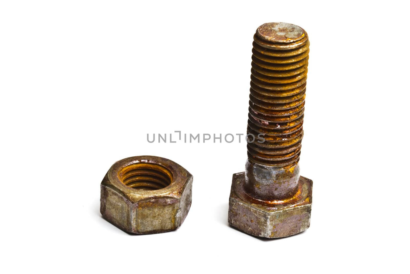 Rusty nut and bolt isolated on white background