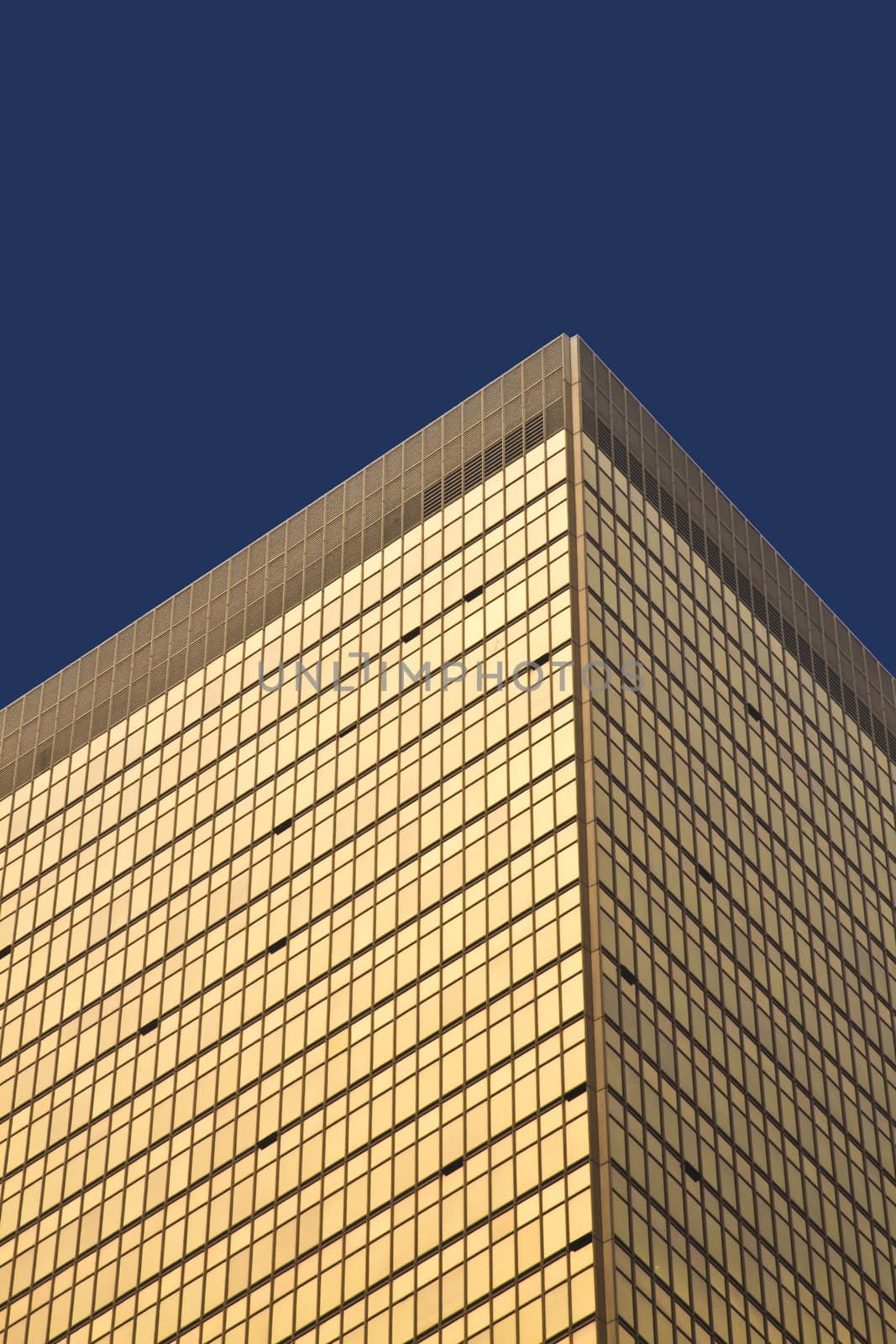 Hong Kong skyscraper windows with blue sky