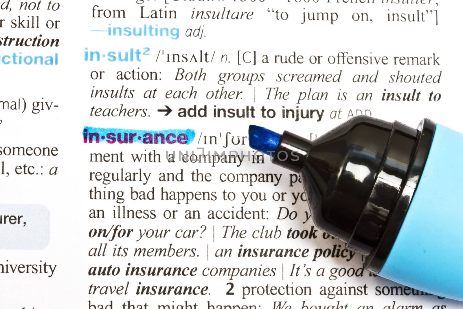 The word "Insurance" highlighted in a dictionary