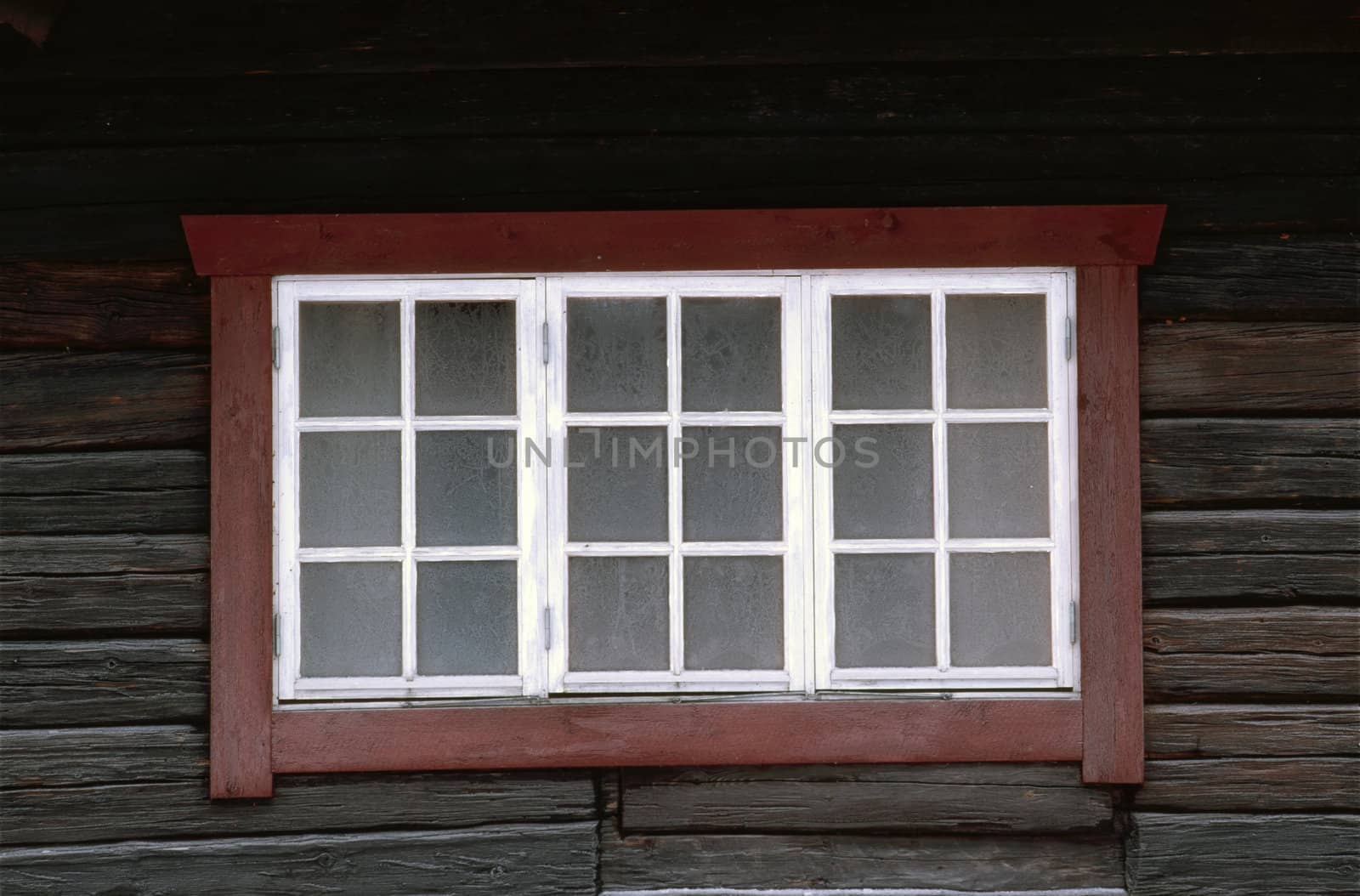 Old window and wooden wall 