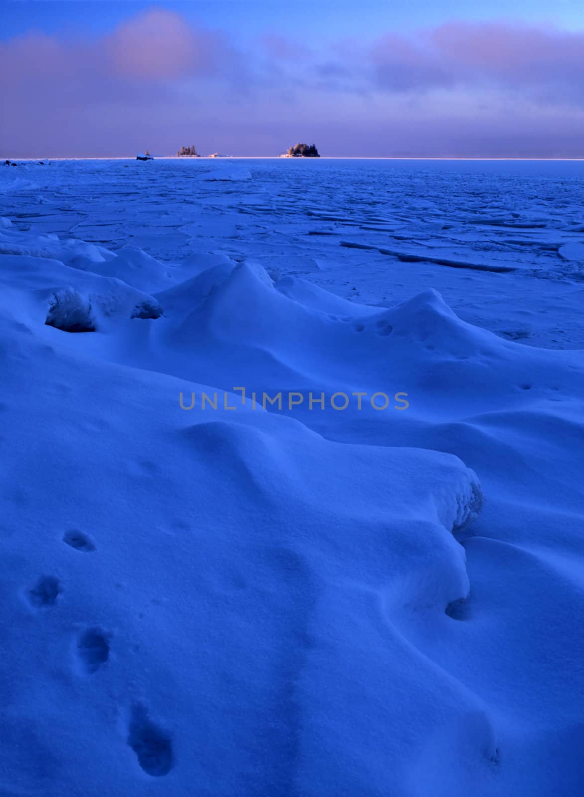Beautiful blue ice floating in the lake 