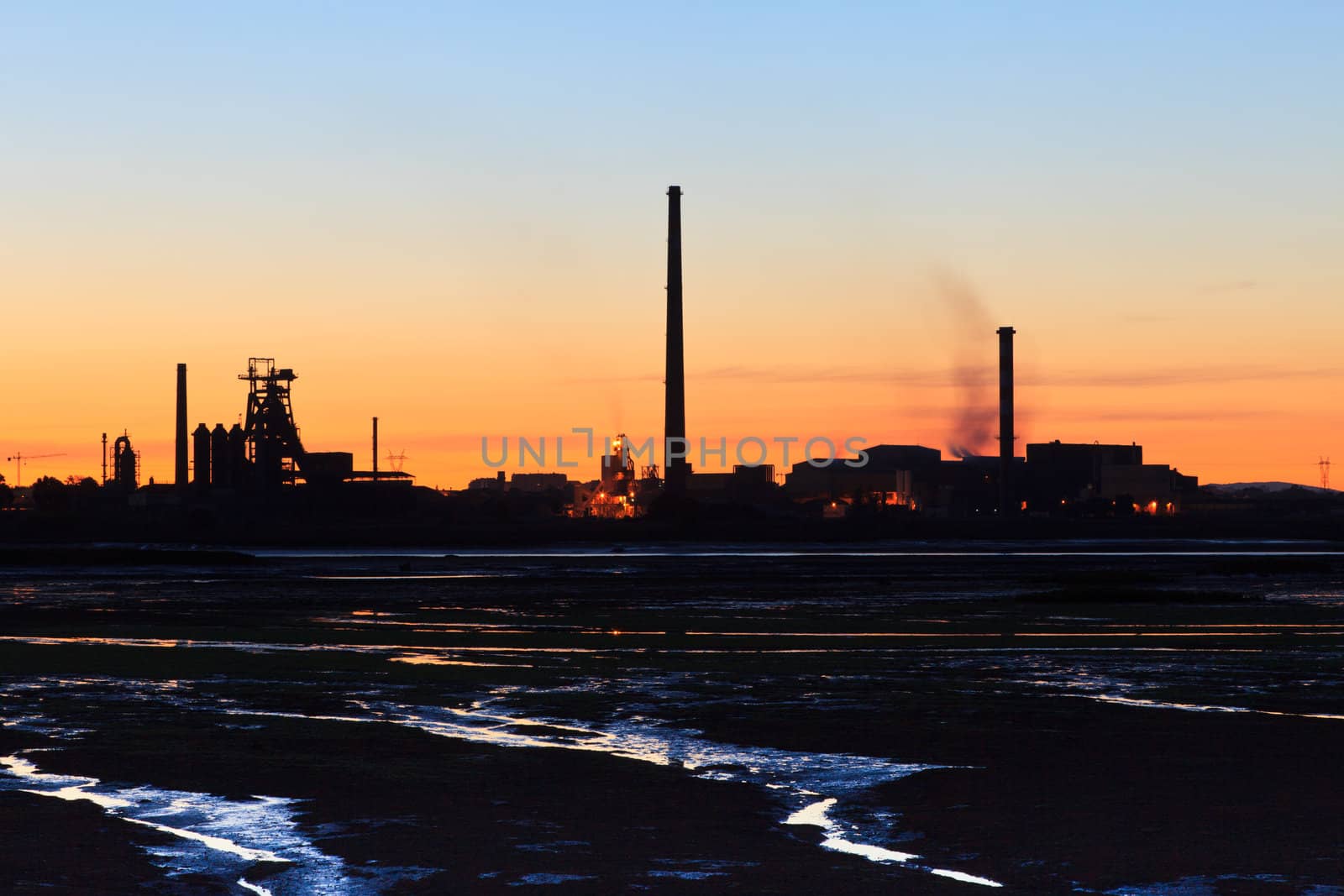 Sunset on Tejo river during low tide.