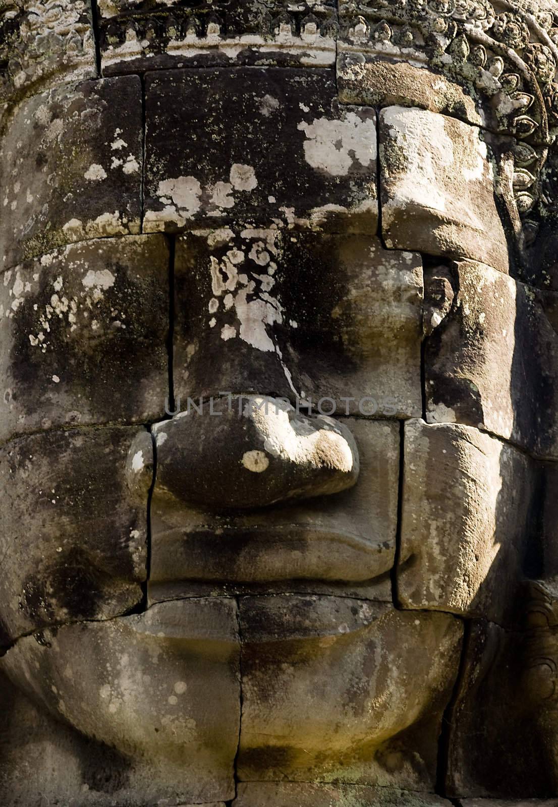 Ancient statue in Angkor Wat, Cambodia by johnnychaos