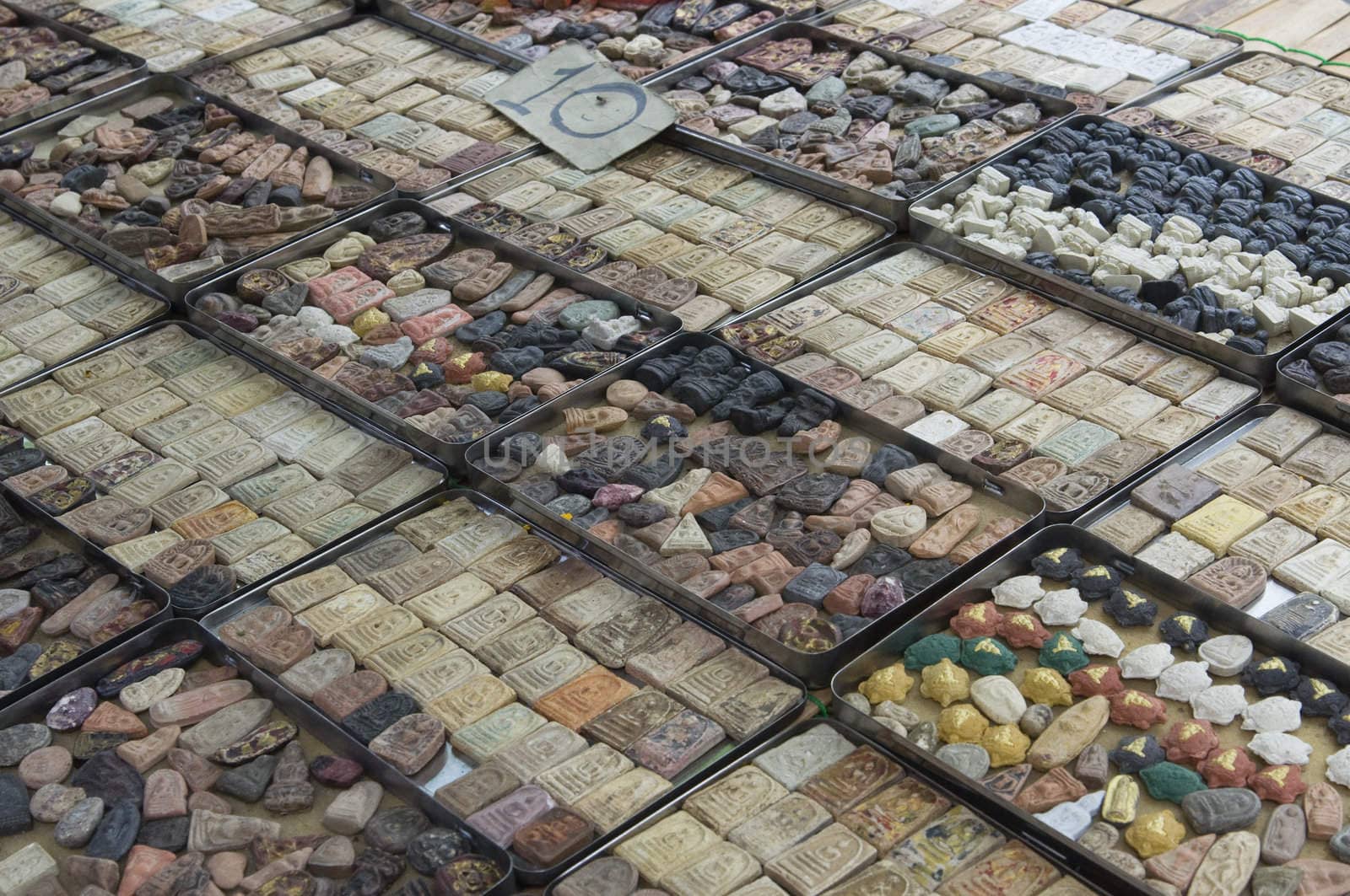 Many buddhist amulets at Talisman Market in Bangkok, Thailand