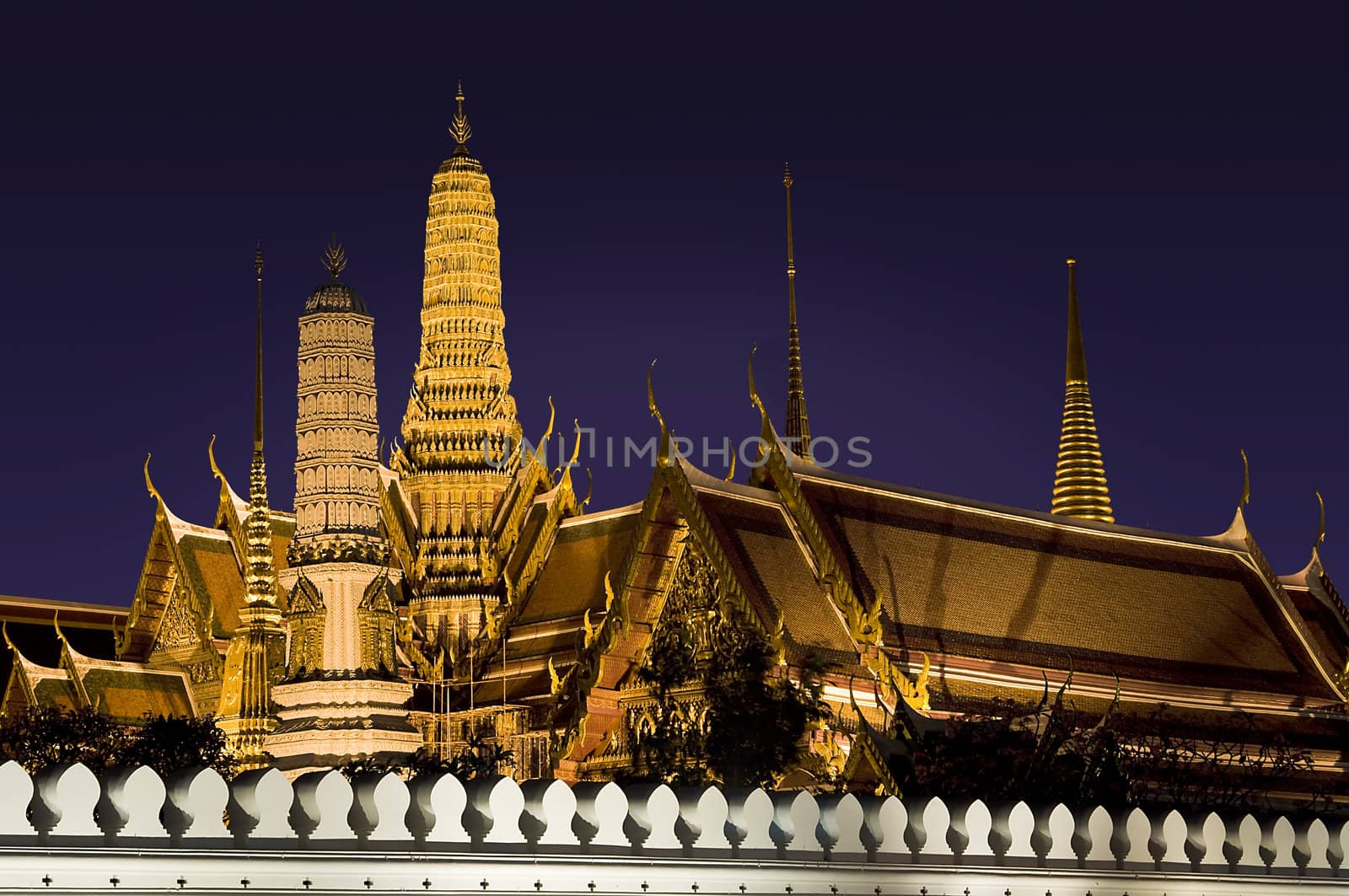 Buddhist temple Grand Palace at night in Bangkok, Thailand