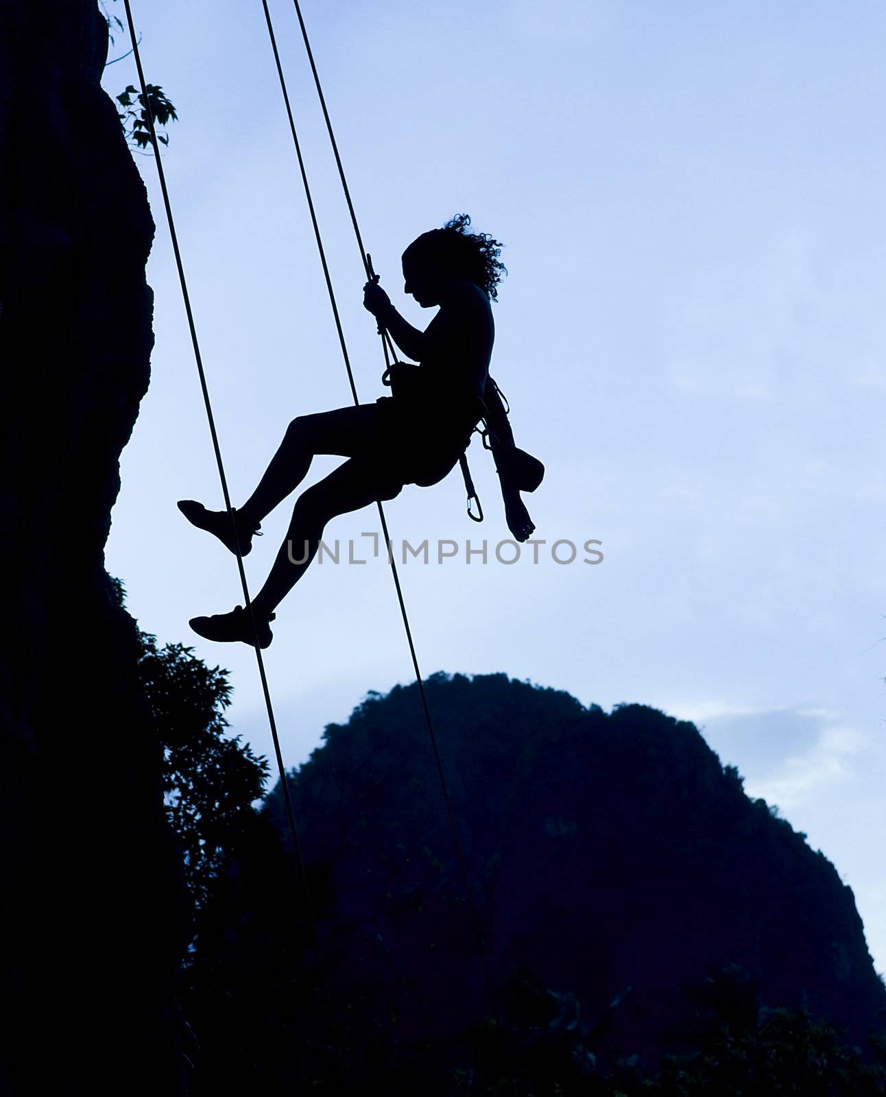 Climbing woman silhouette by johnnychaos