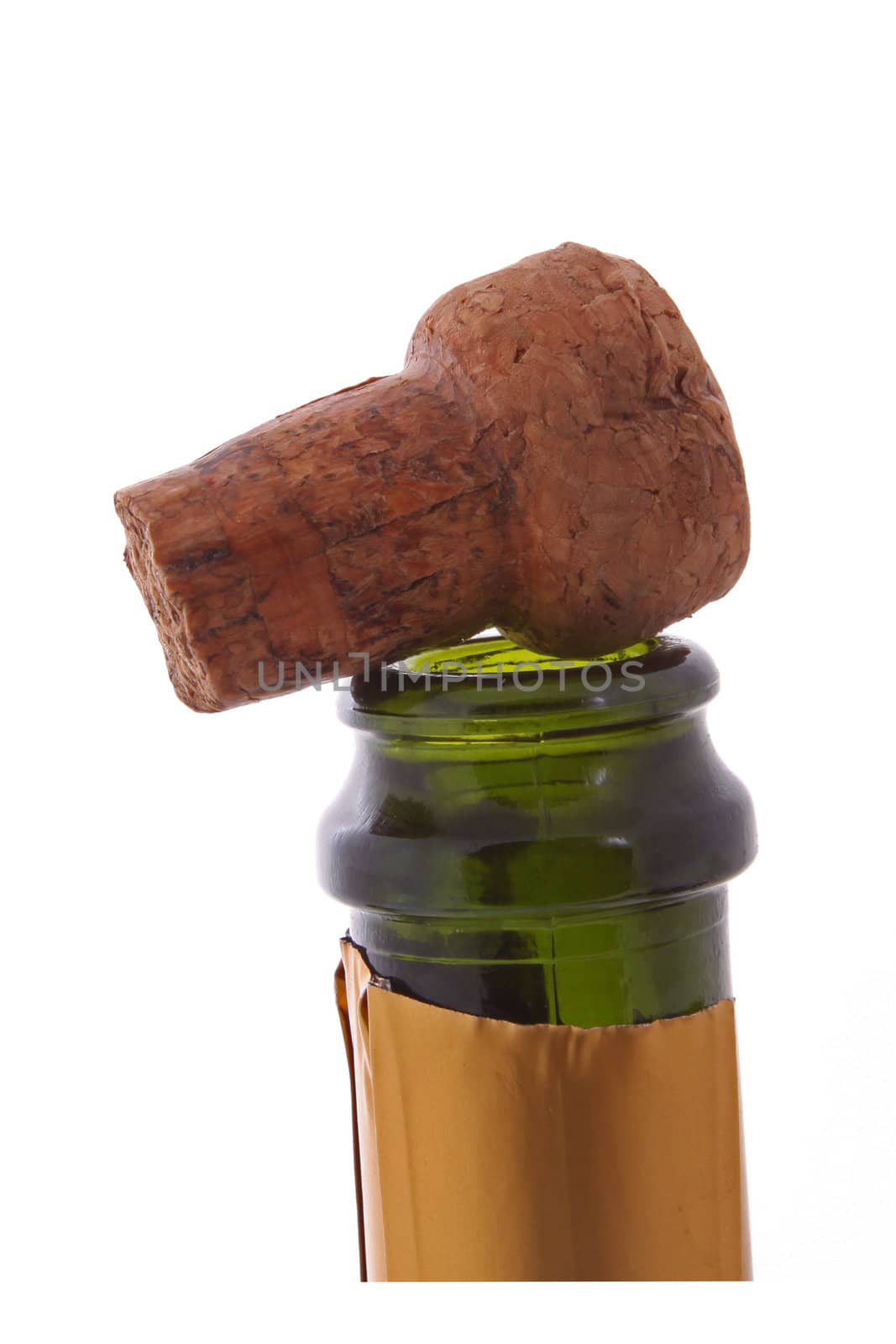 Champagne bottle and cork on a plain white background.