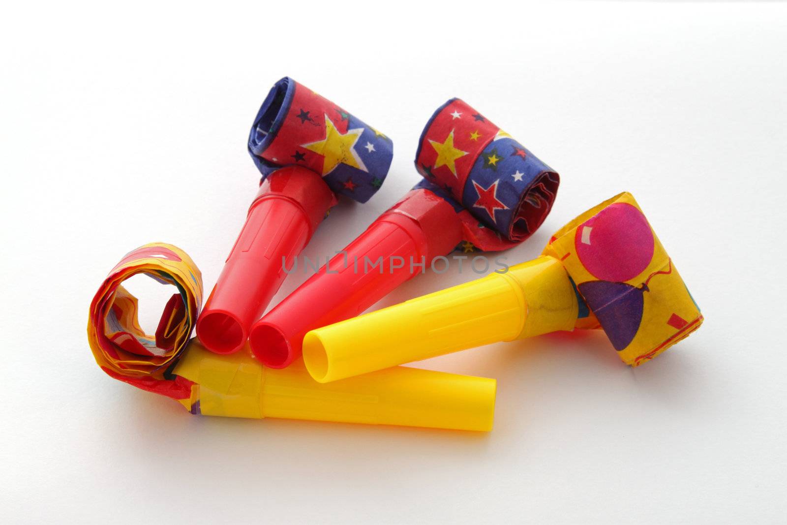 Party blowers on a plain white background.