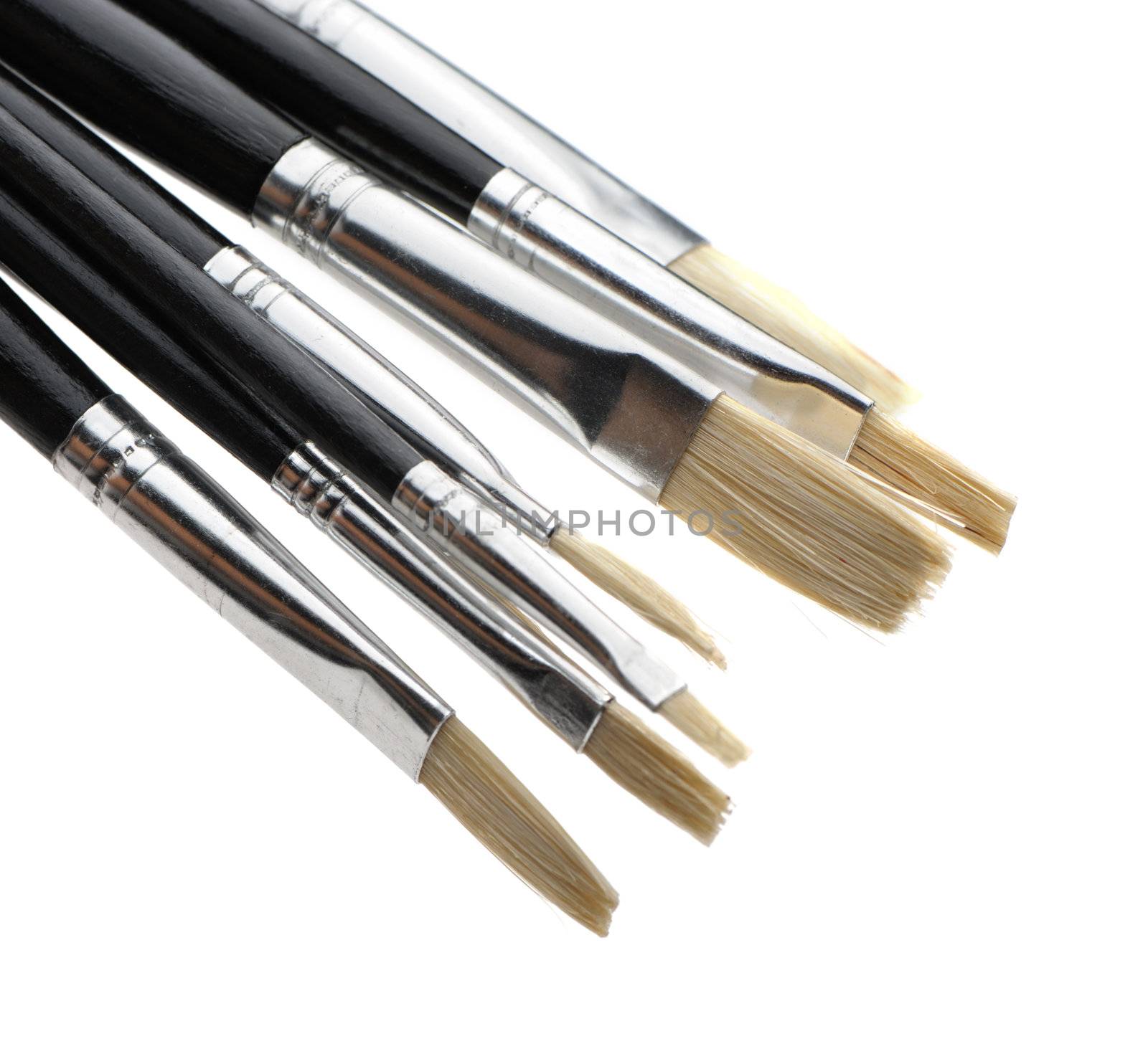 Art brushes close up. It is isolated on a white background