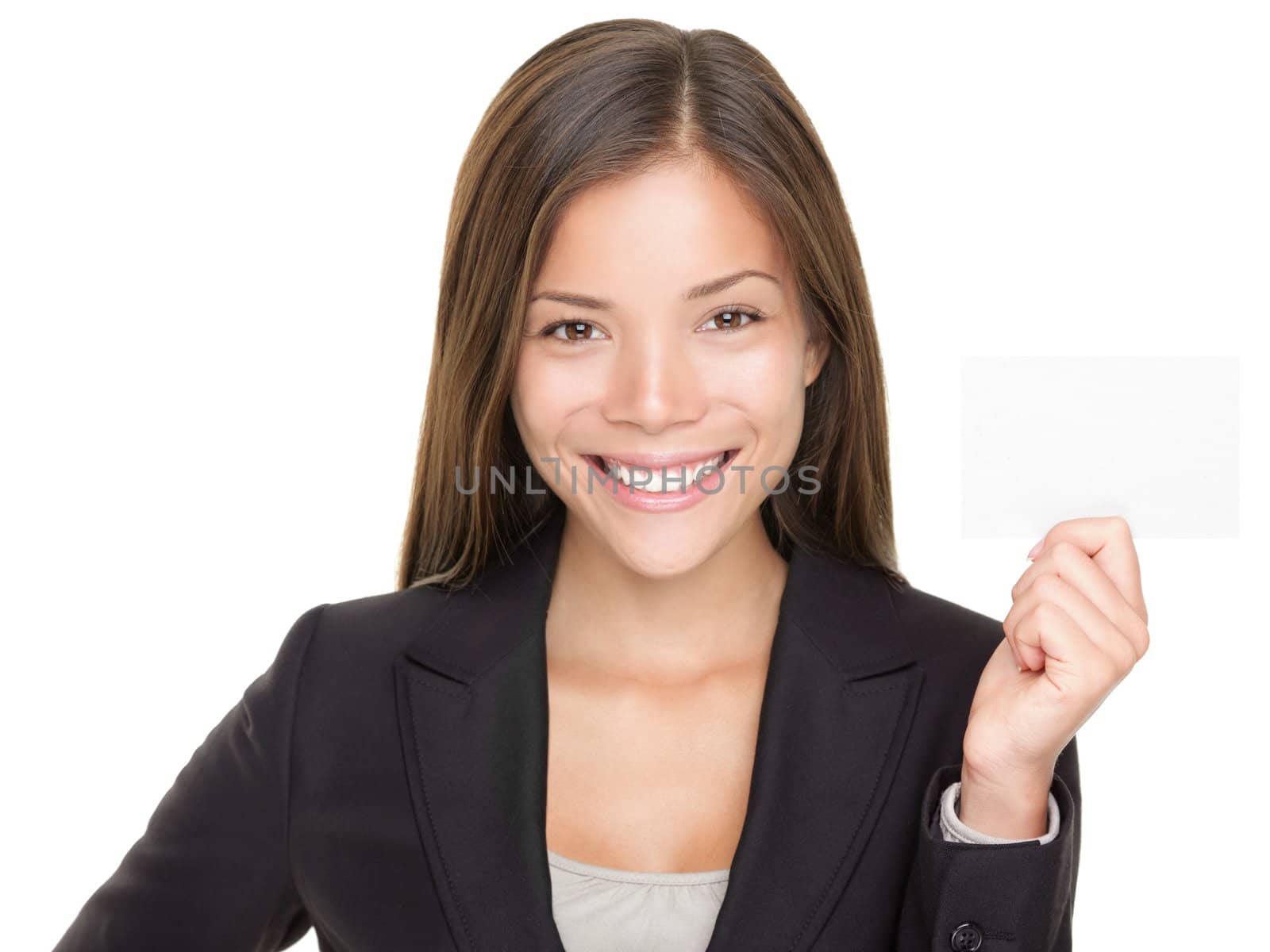 Beautiful Asian businesswoman showing business card. Young confident mixed race Asian / Caucasian woman showing sign with copy space isolated on white background.