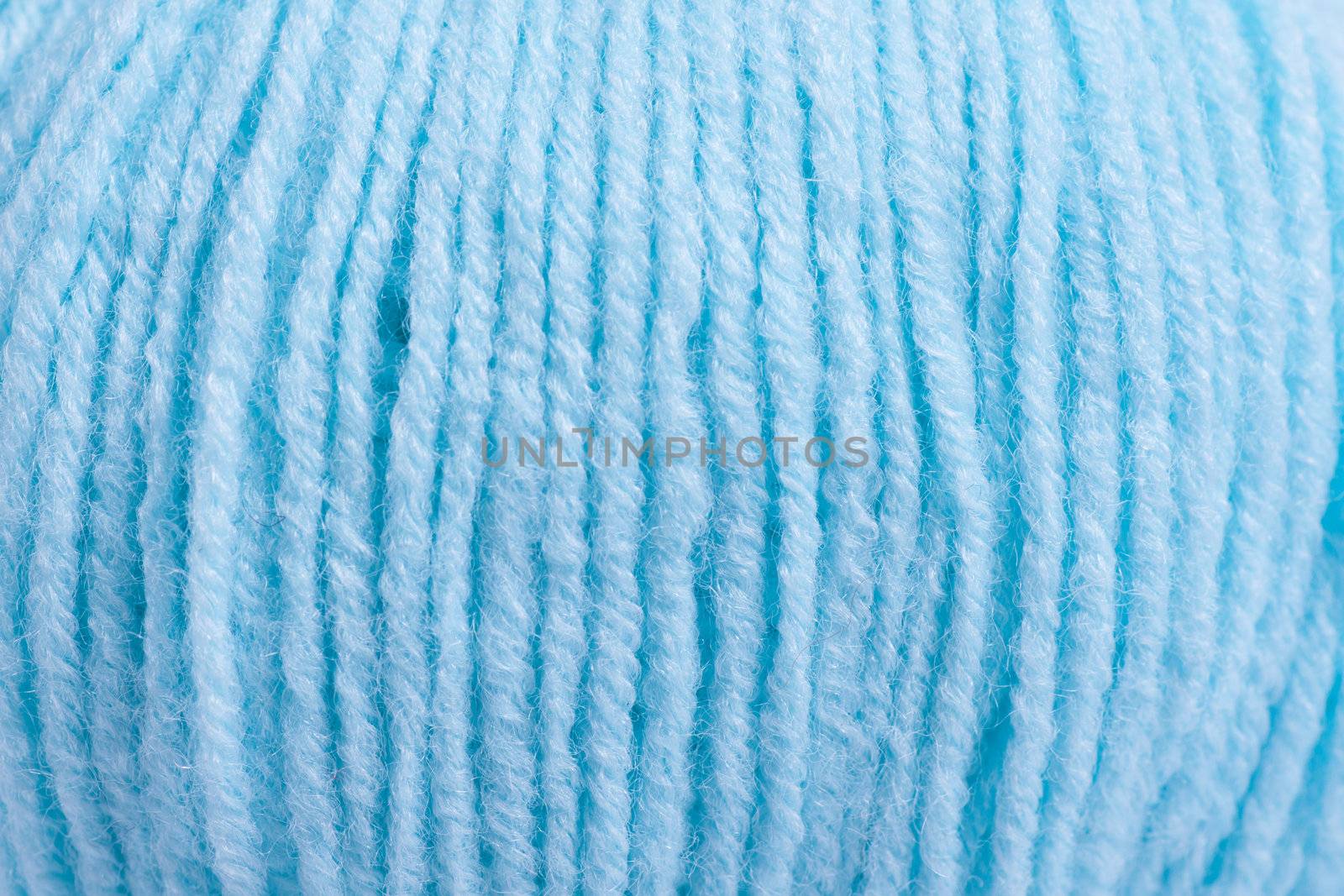 Macro view of blue wool ball texture