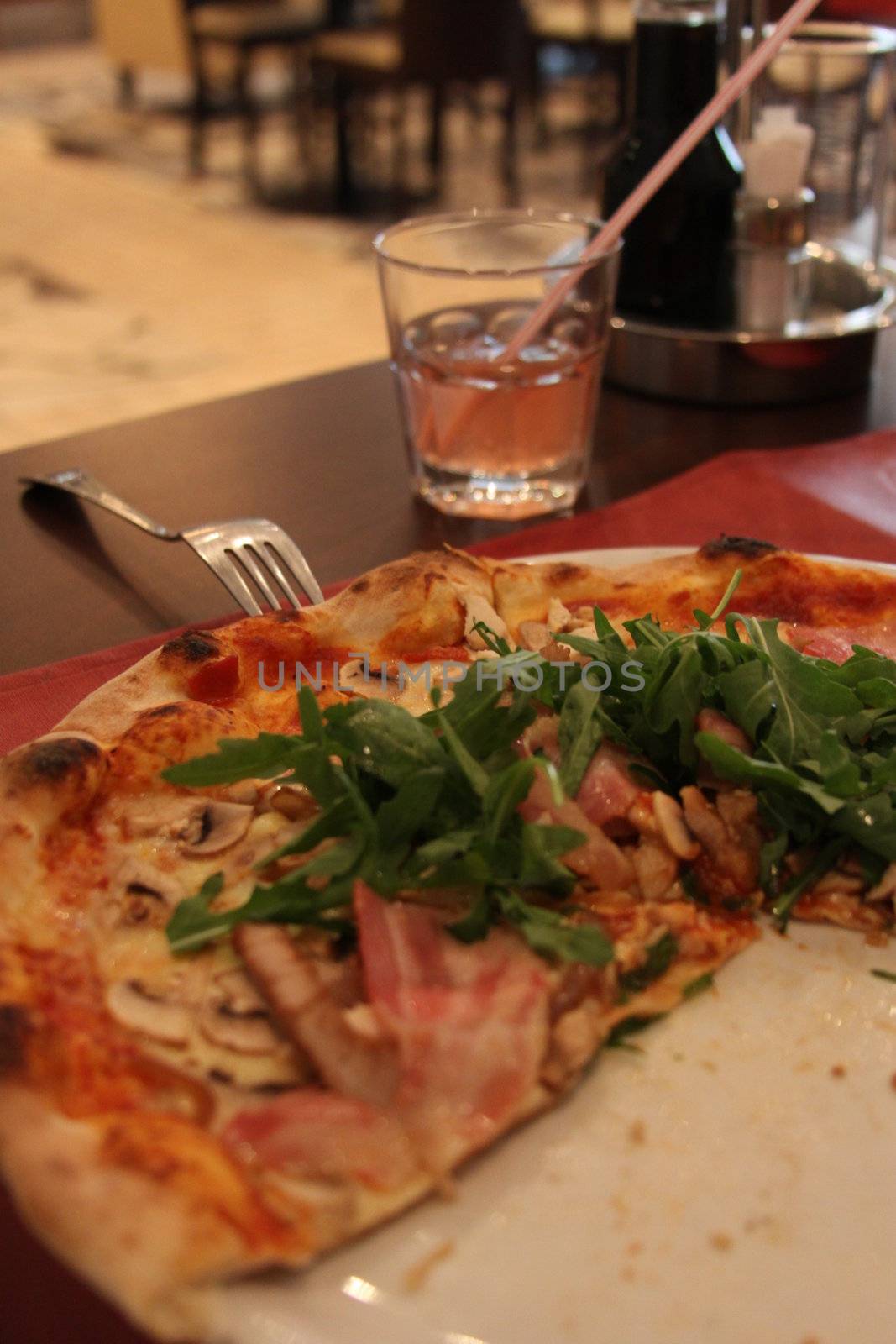 Close up the pizza on a plate.