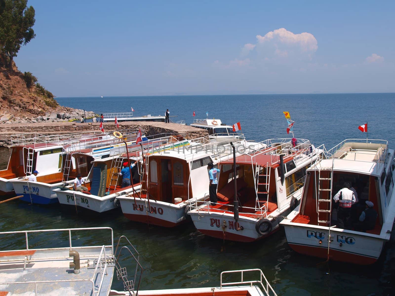 small harbor on the shore of Titicaca lake, Peru