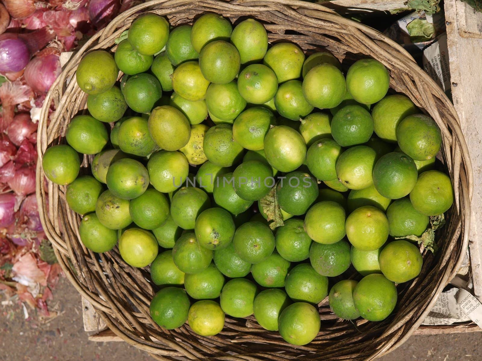 basket of fresh, green limes
