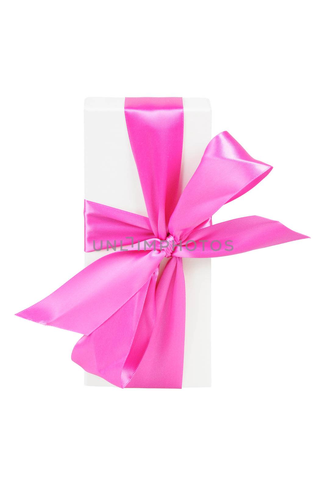 Gift box with a big pink bow. Isolated on white.