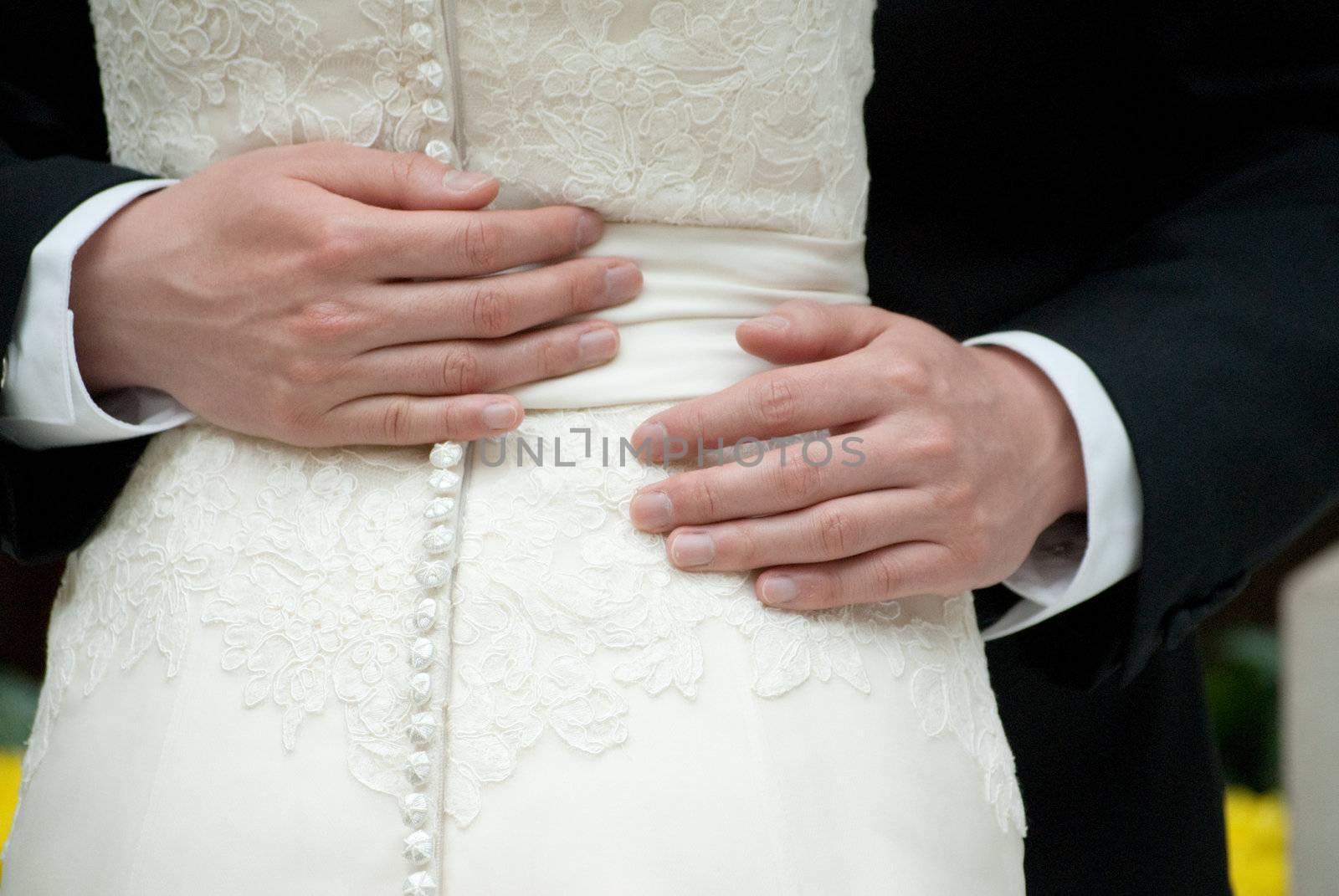 Bride and Groom showing Affection