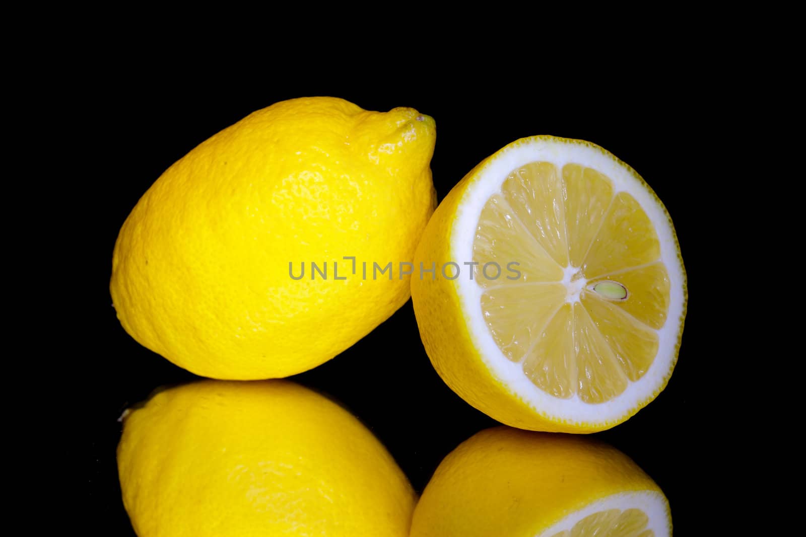 Lemon isolated on black background
