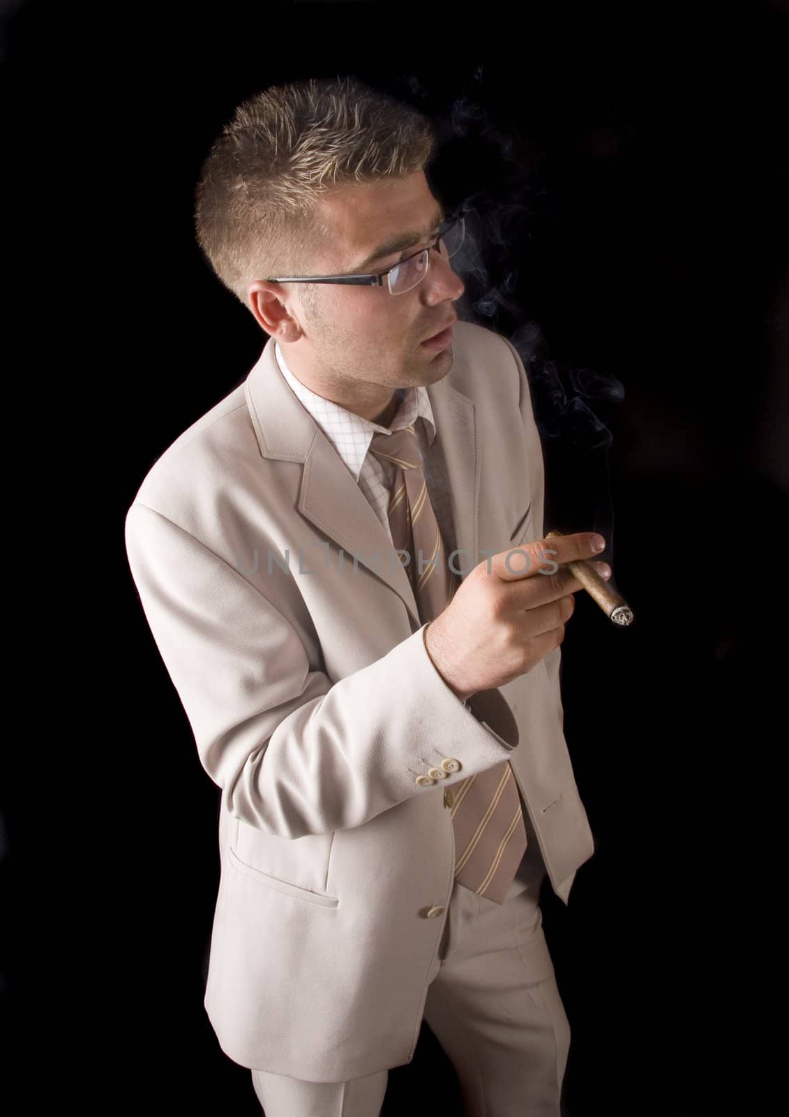 Businessman smoking cigar