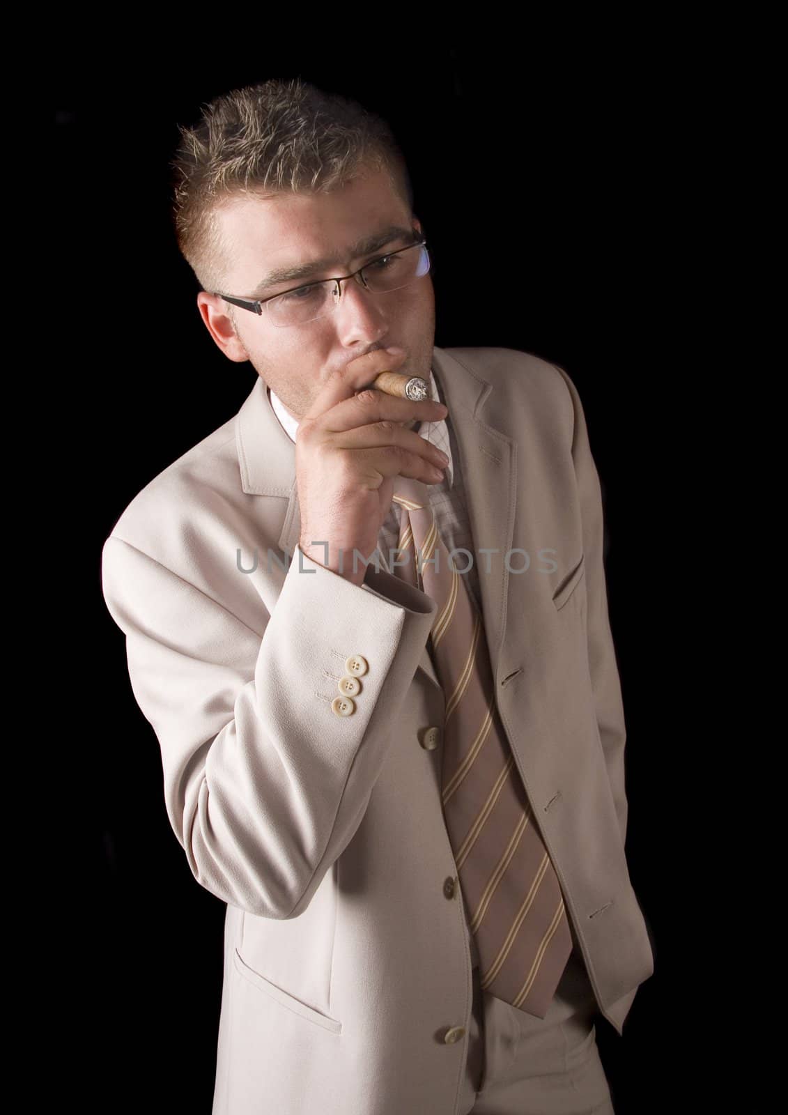 Businessman smoking cigar