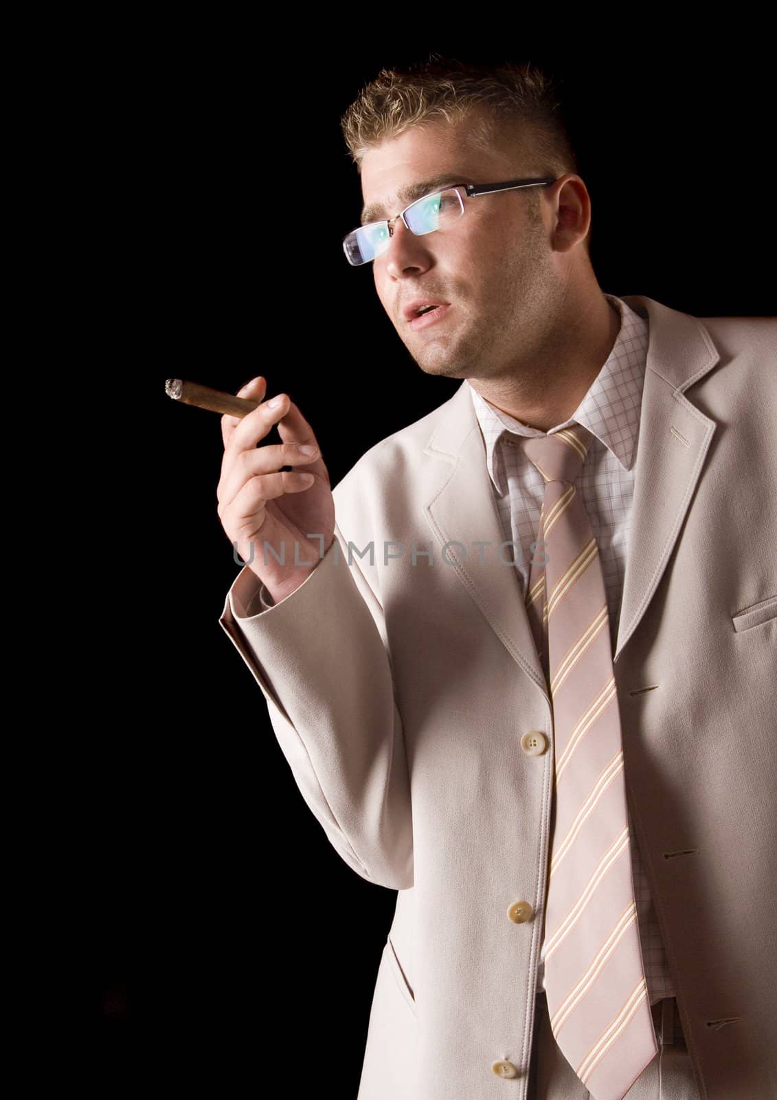 Businessman smoking cigar