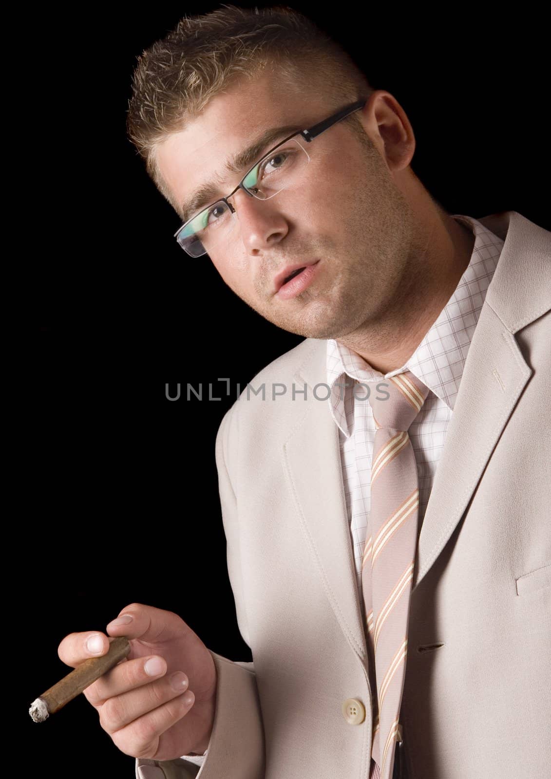 Businessman smoking cigar