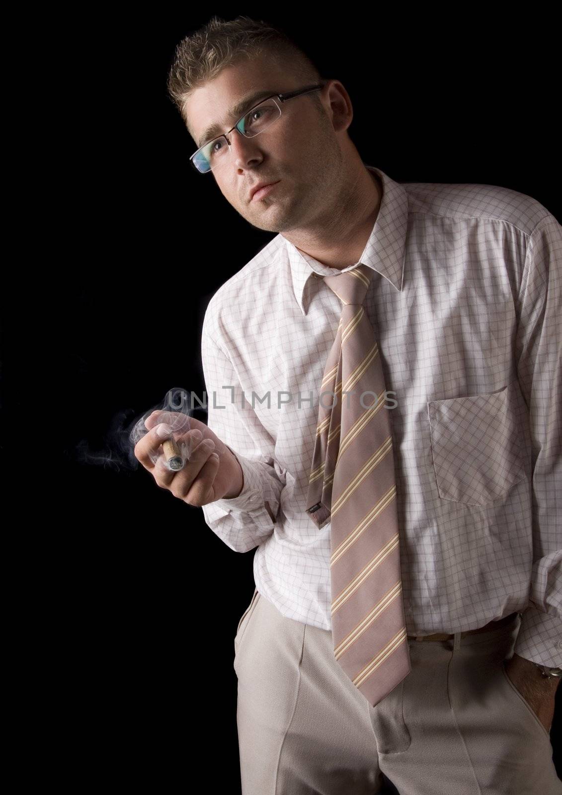 Businessman smoking cigar