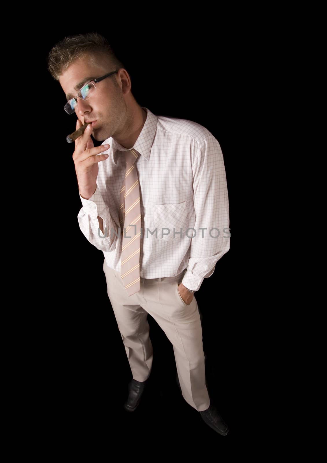 Businessman smoking cigar