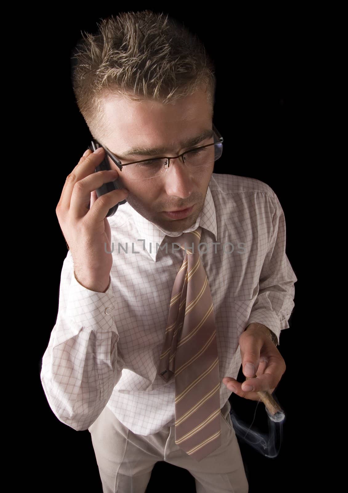 Businessman smoking cigar