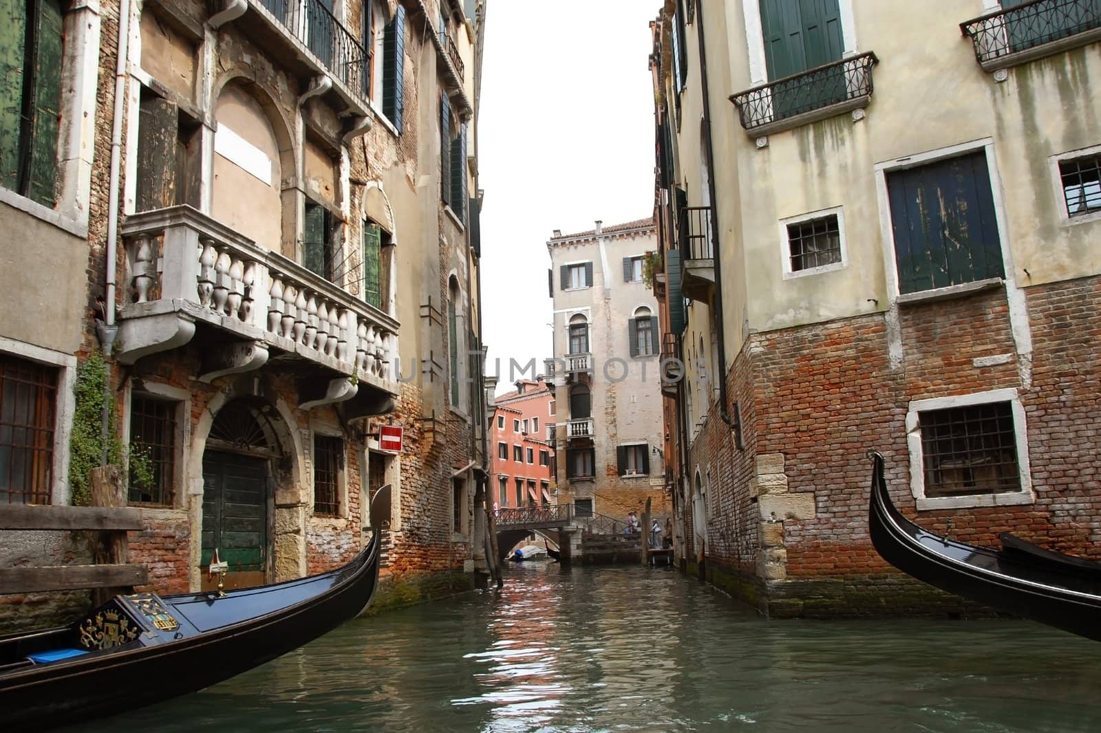 water canal between old buildings in Venice