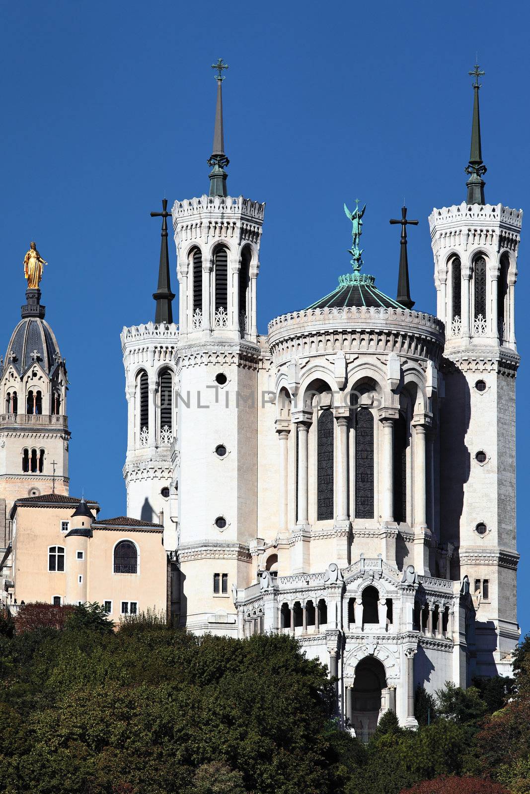 Lyon basilica and statue in the blue sky 