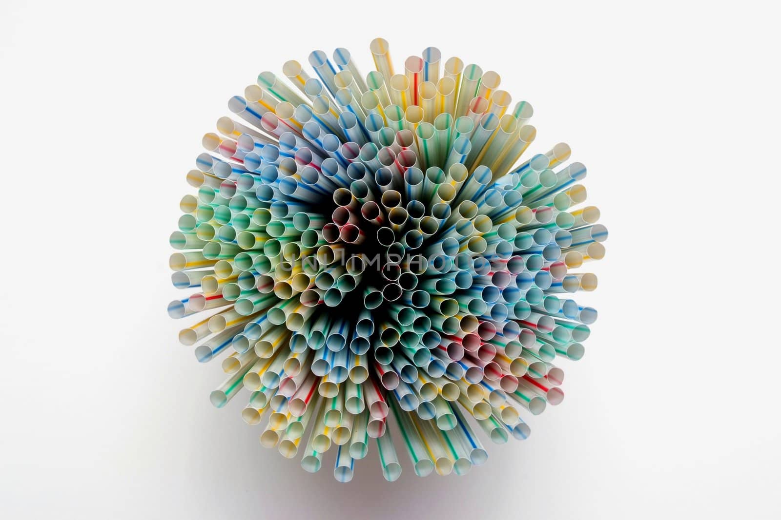 Many drinking straws in a container looking down