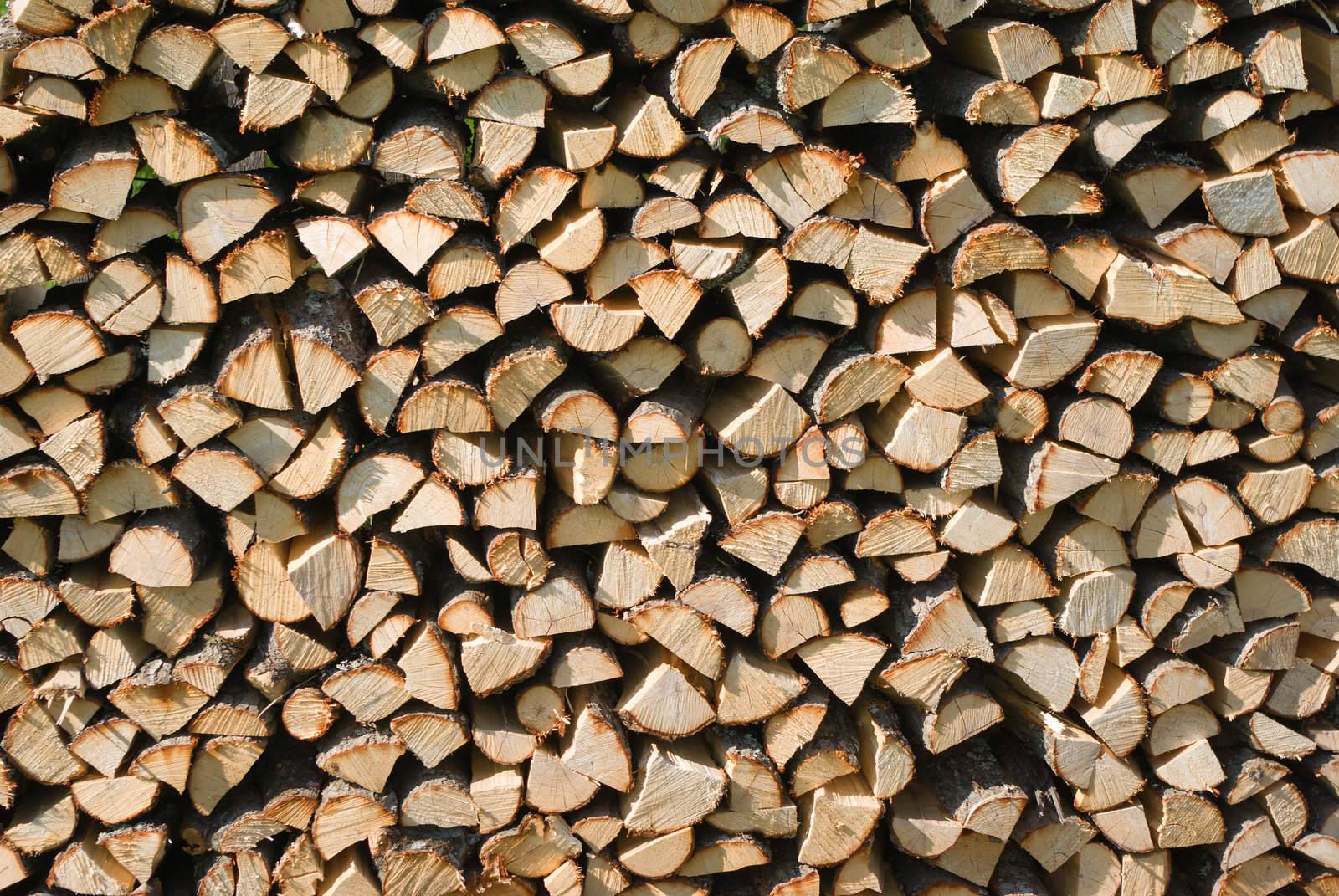 Wood pile, interesting composition.stack of logs for firewood 