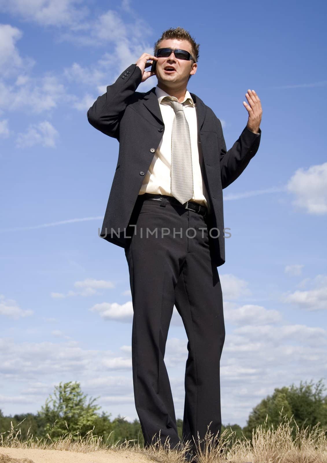 A businessman dressed in a smart suit by shiffti