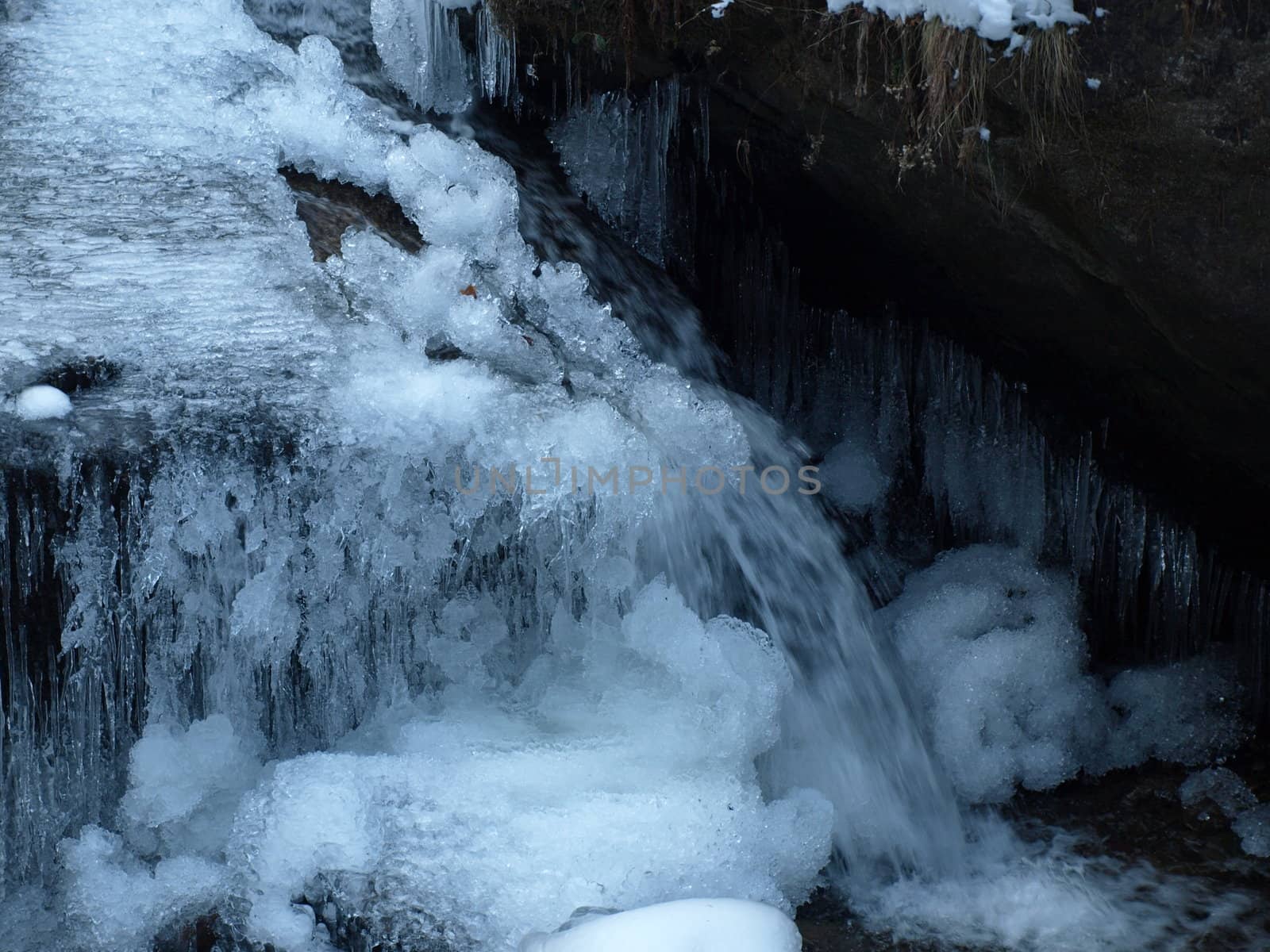 View along the Jacobs Fork River at South Mountain State Park after a snow fall