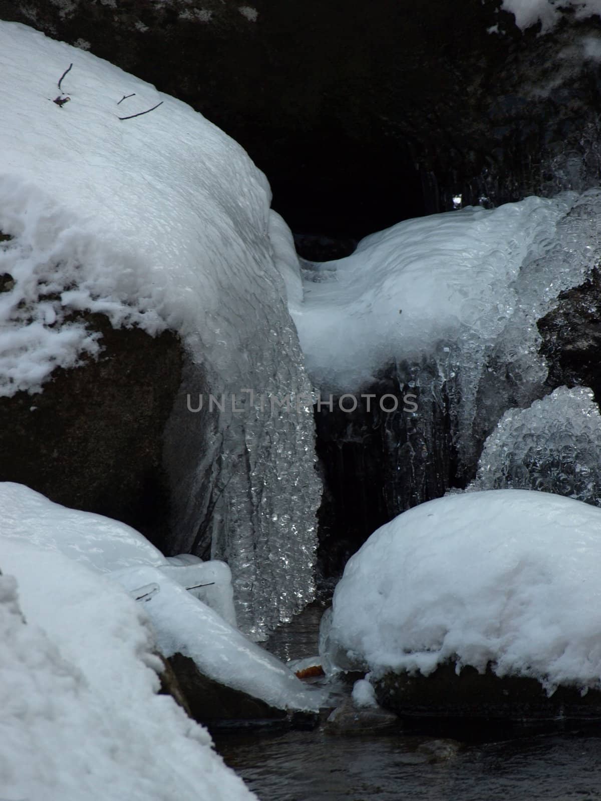 View along the Jacobs Fork River at South Mountain State Park after a snow fall