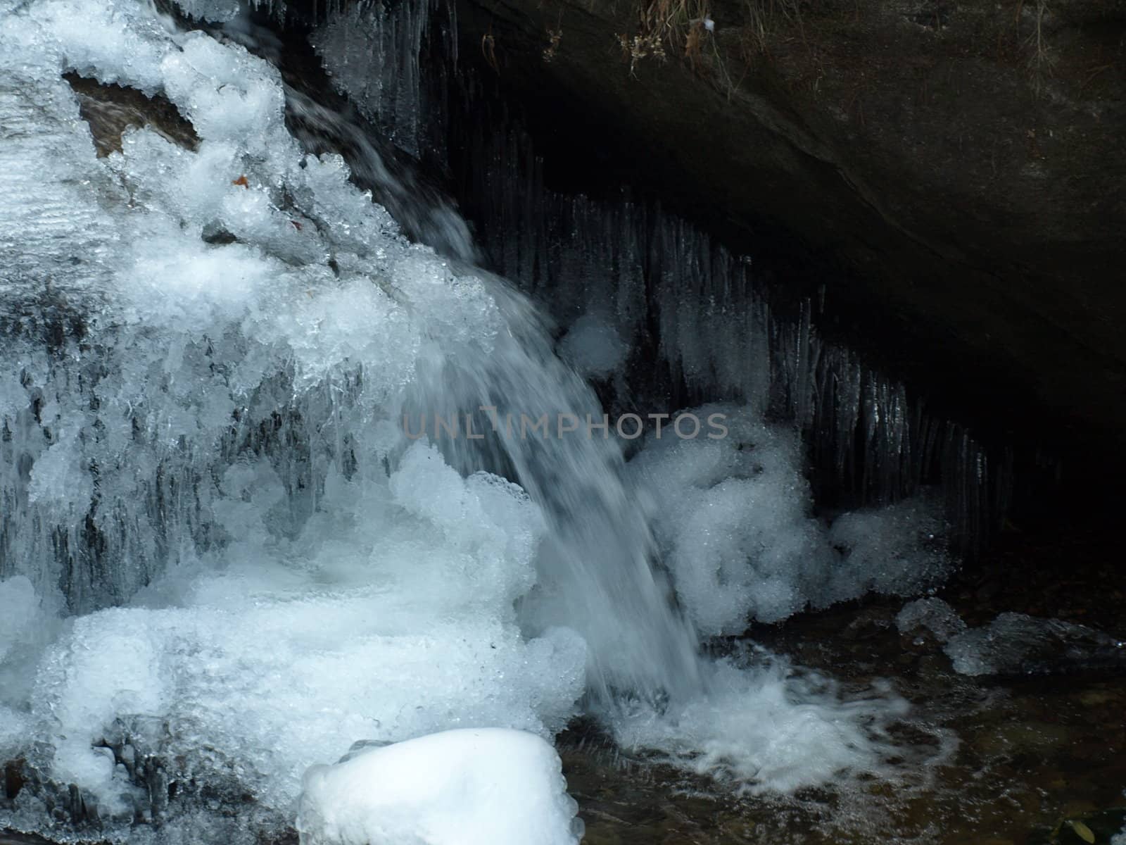 View along the Jacobs Fork River at South Mountain State Park after a snow fall