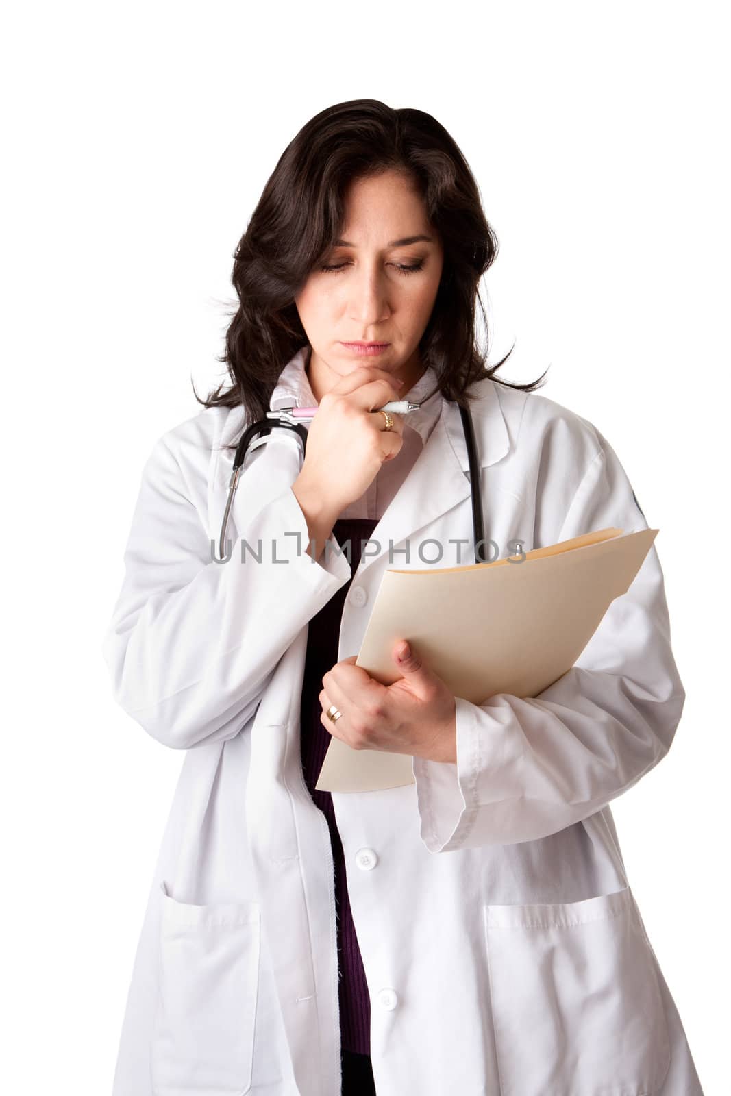 Female doctor in white coat looking at patient record chart and thinking about health, isolated.