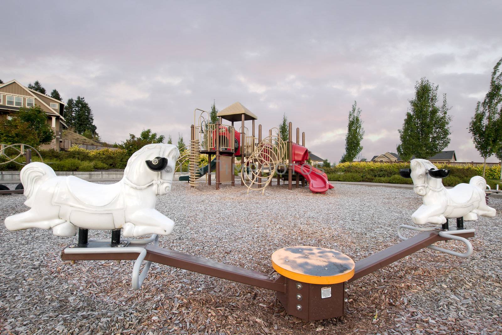 Neighborhood Public Park Children's Playground in Suburban Area with Seesaw