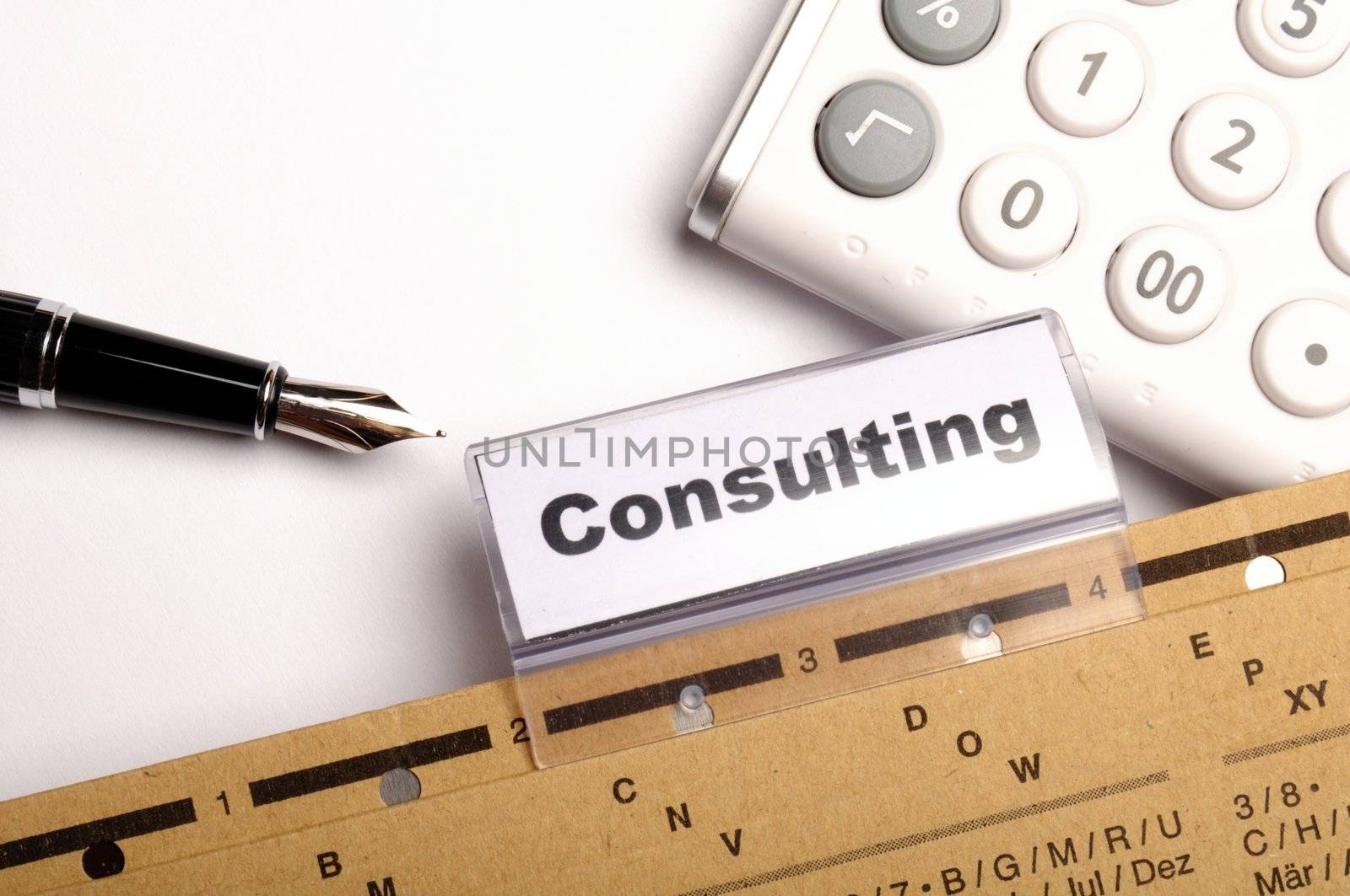 consulting word on business office folder rider showing financial success concept
