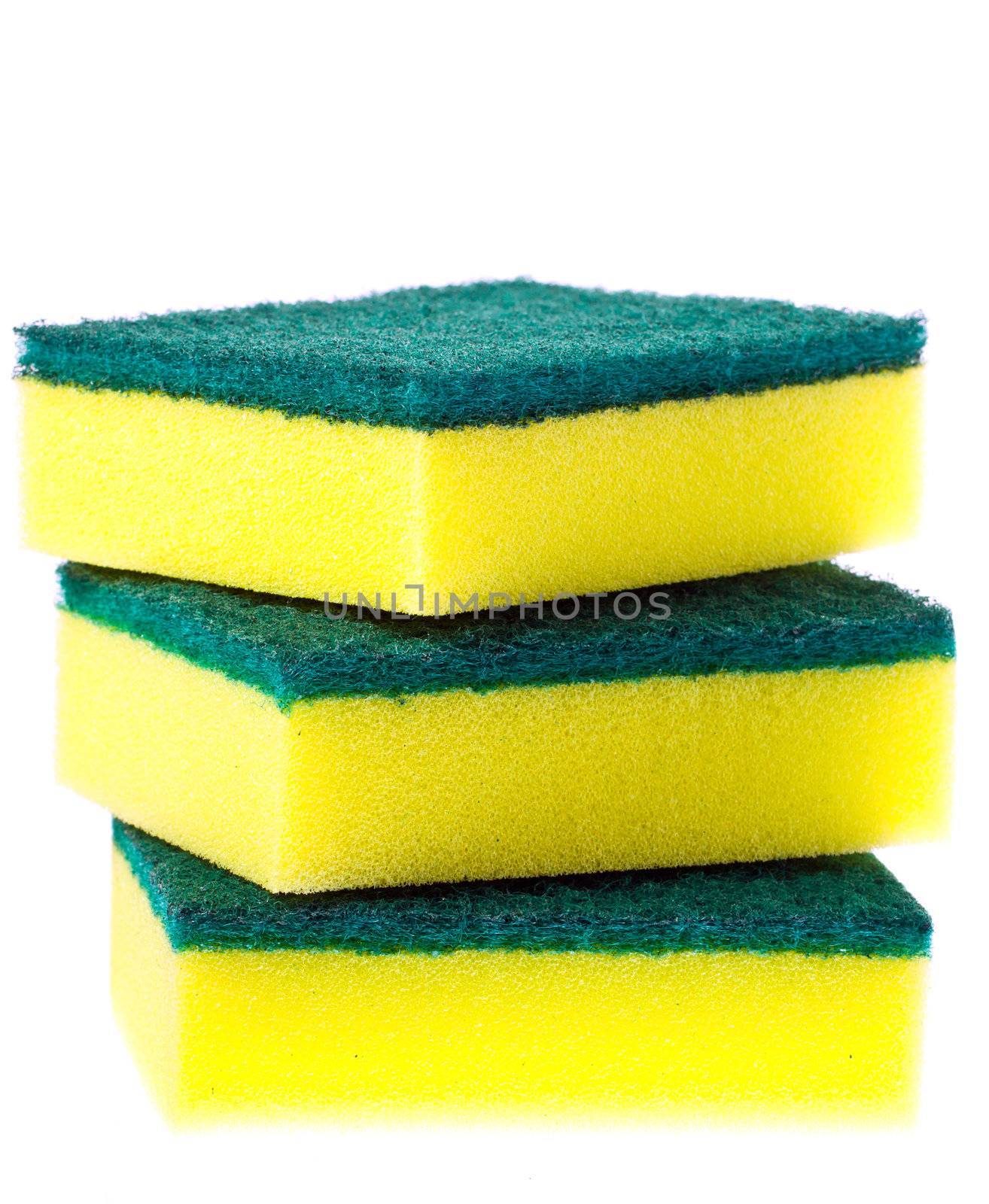 Stack of colorful scrubber pads or scourers.  by Jaykayl
