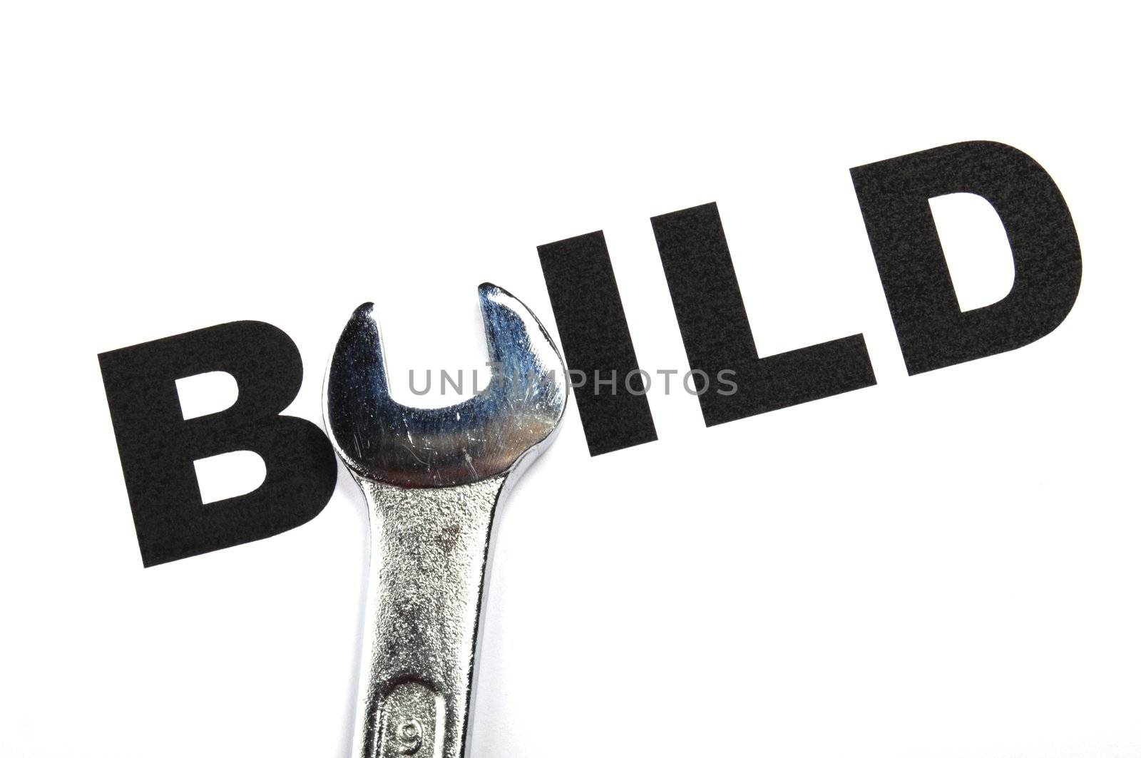 build and tools showing construction concept with word