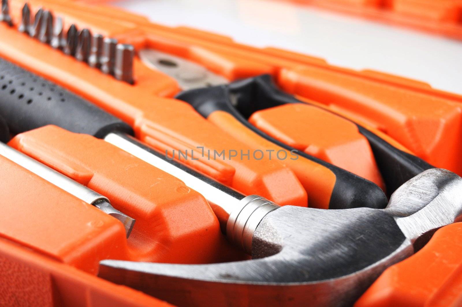 toolbox kit with hammer and screwdriver showing construction concept