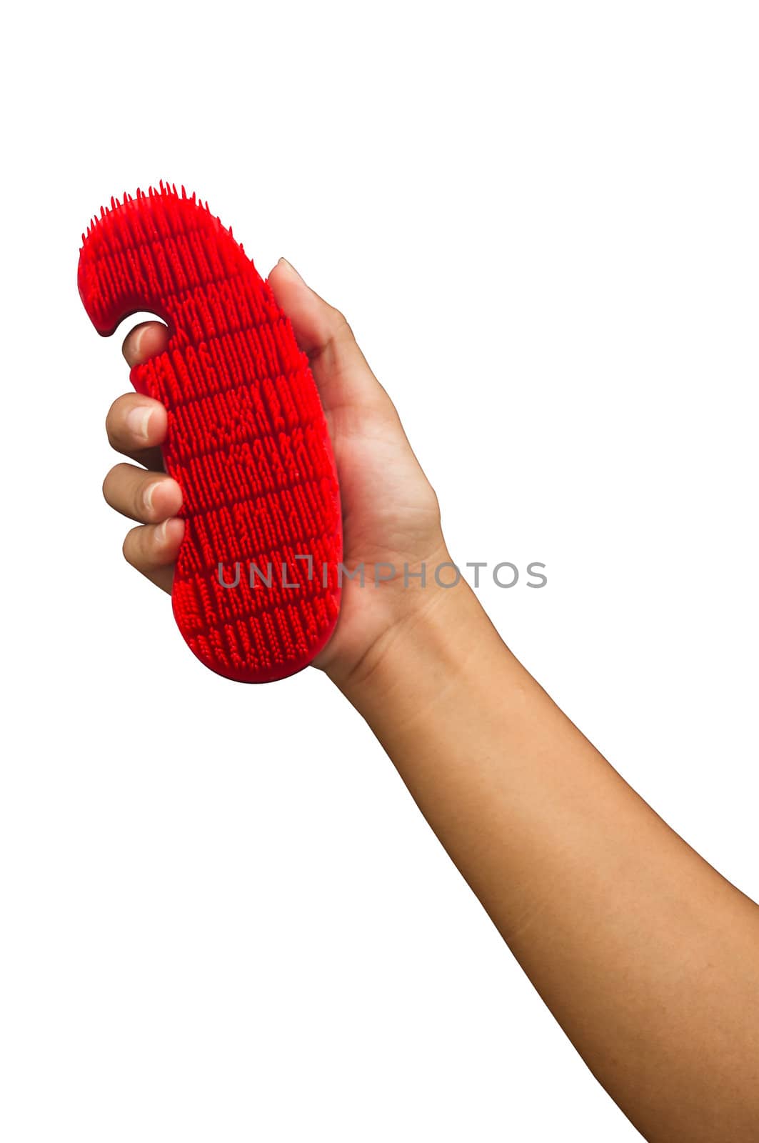 isolated hand with scrubbing brush, clipping path is in jpg.