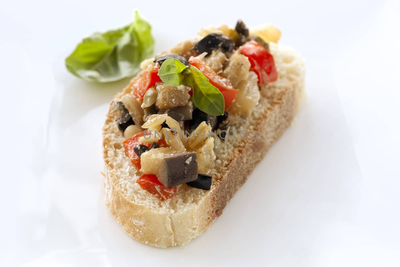 Bruschetta: Prepared fresh with peppers, olives, aubergine and fresh basil.