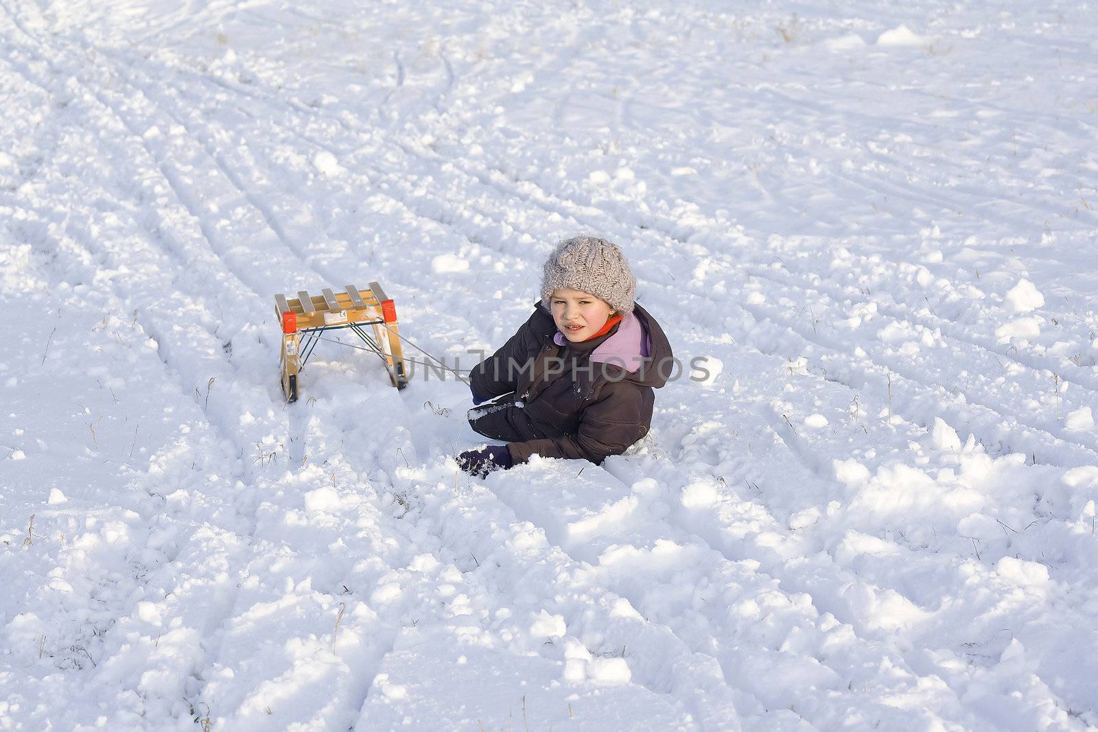  Little girl on snow

