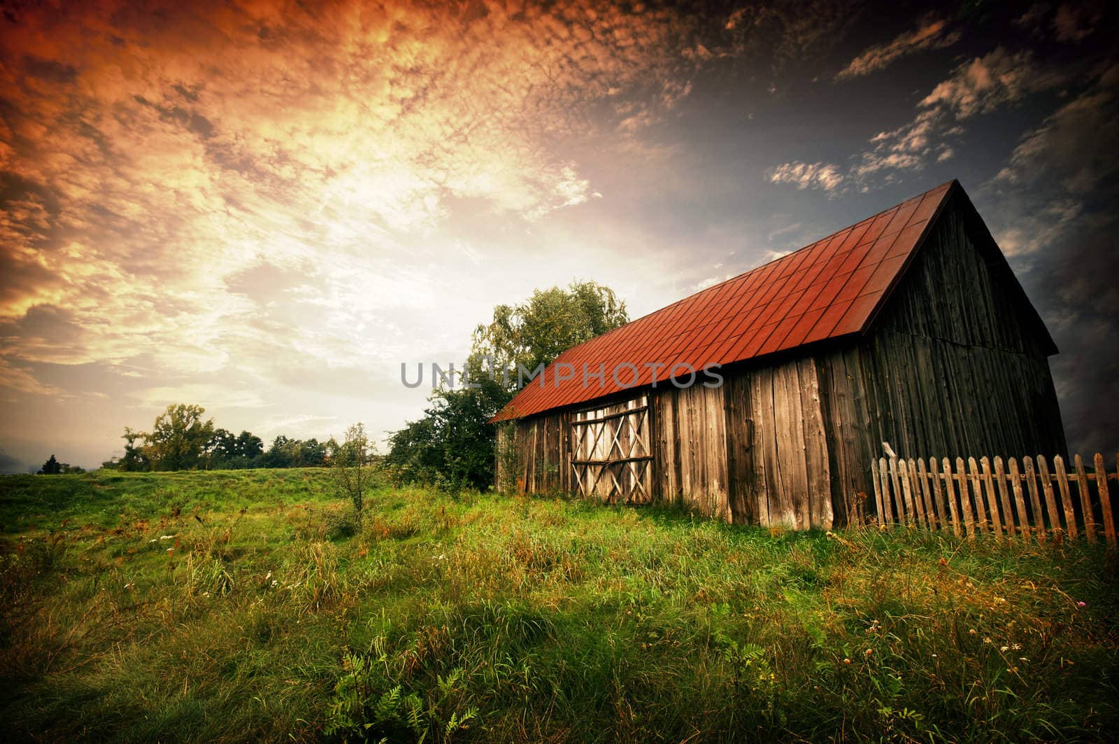 sunset by an old barn by johnnychaos