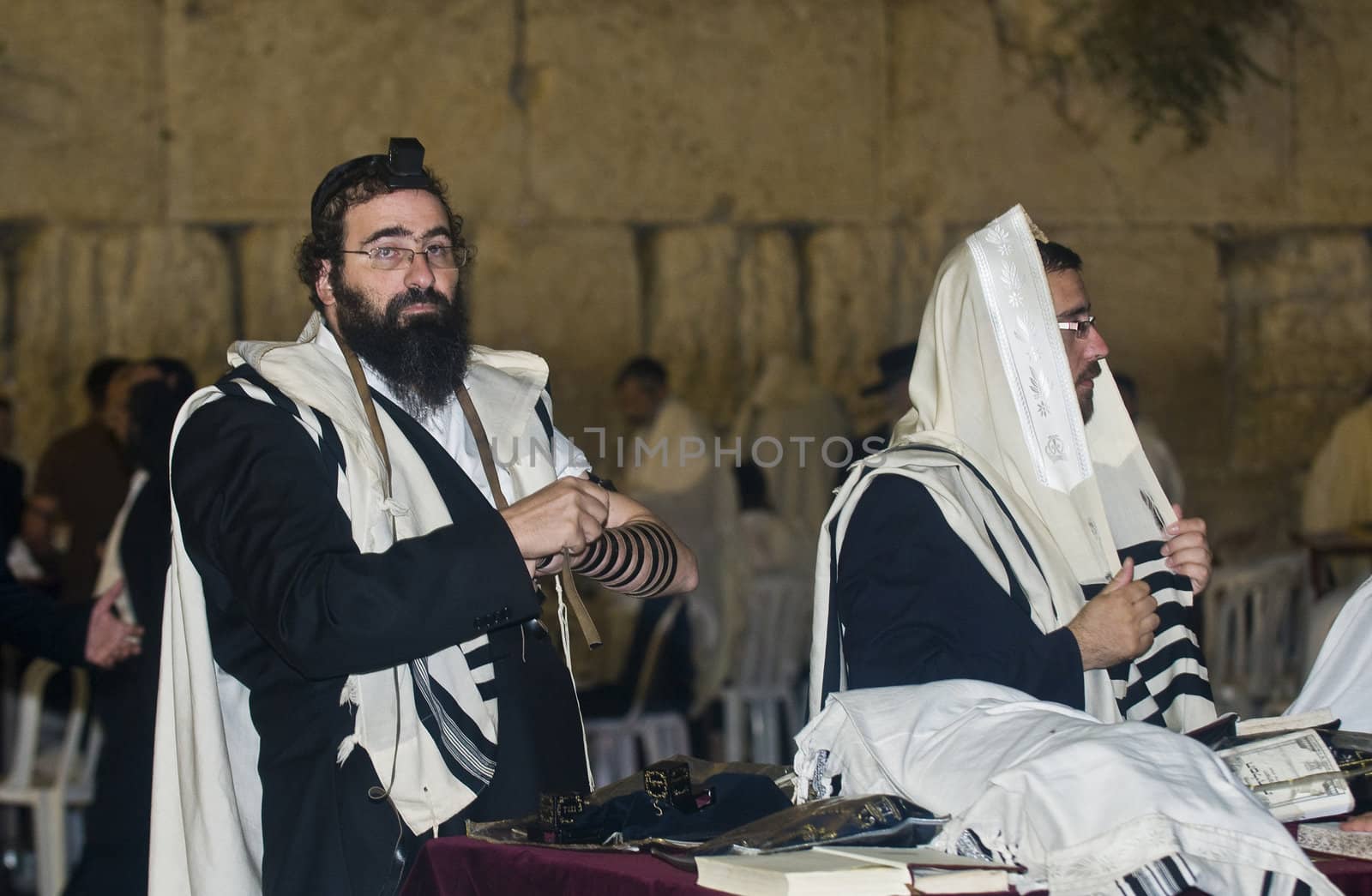 JERUSALEM - SEP 26 : Jewish men prays during the penitential prayers the "Selichot" , held on September 26 2011 in the "Wailing wall"  in  Jerusalem , Israel 